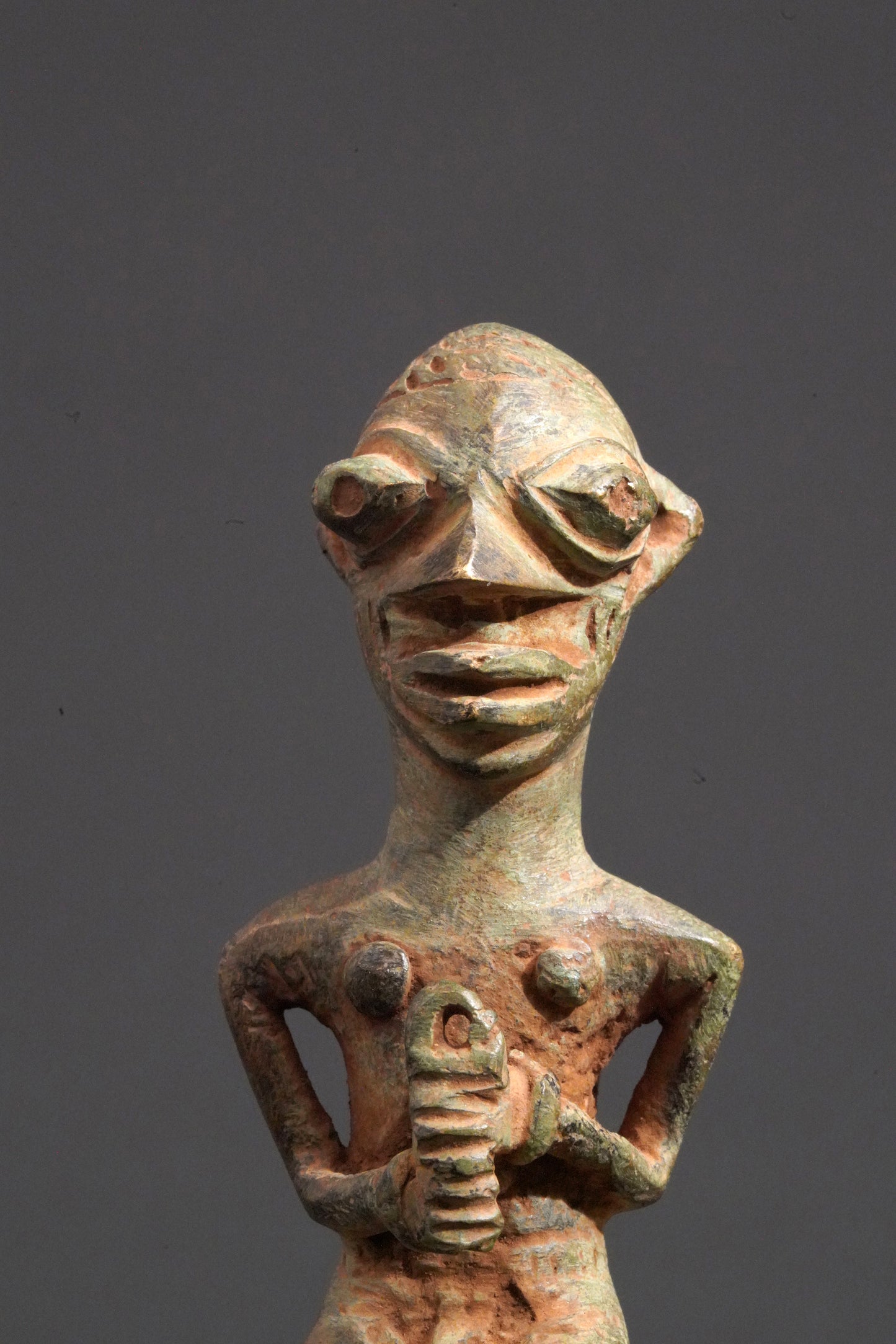 A male Yoruba metal sculpture