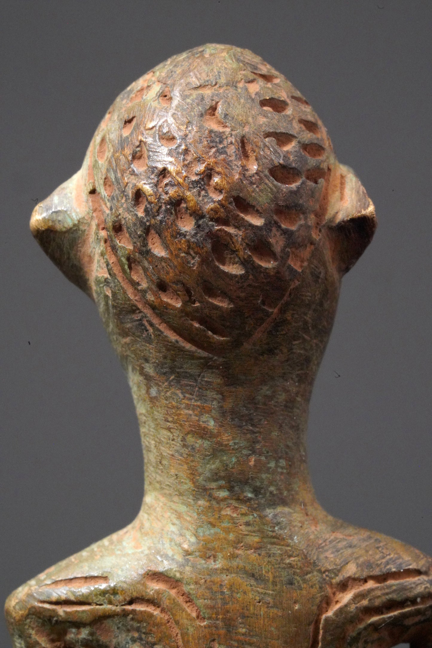 A male Yoruba metal sculpture