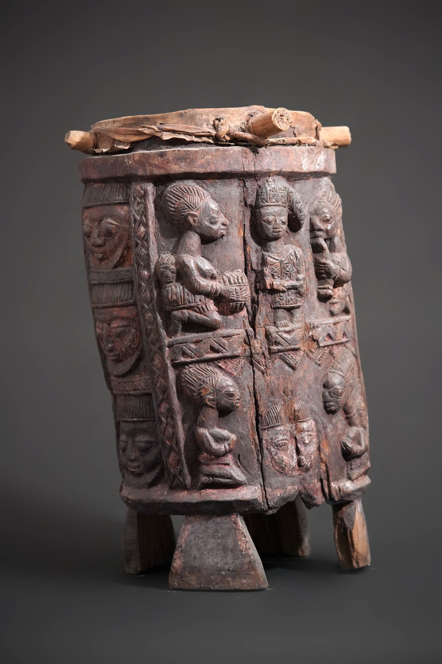 A round, one-piece standing drum on four legs