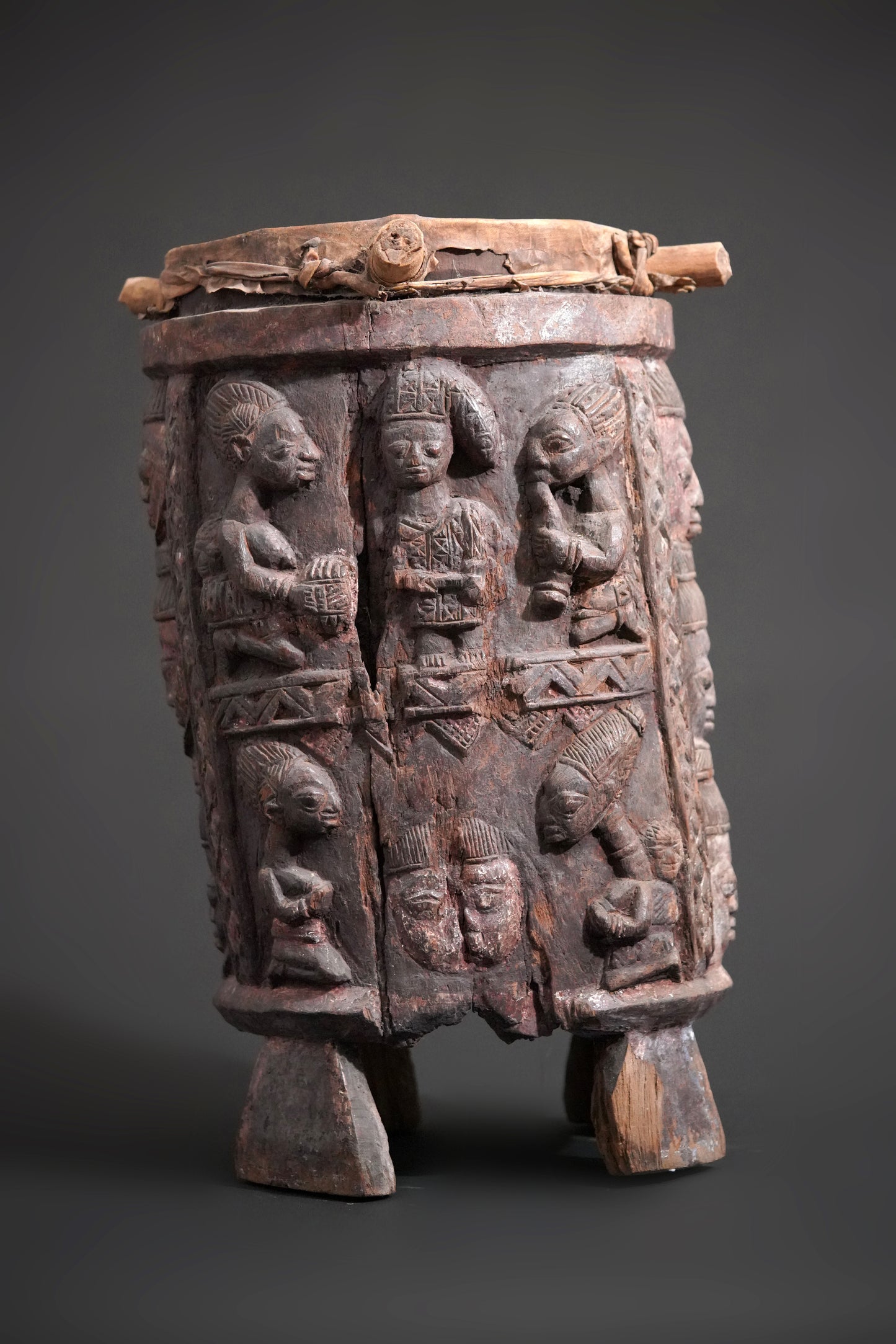 A round, one-piece standing drum on four legs