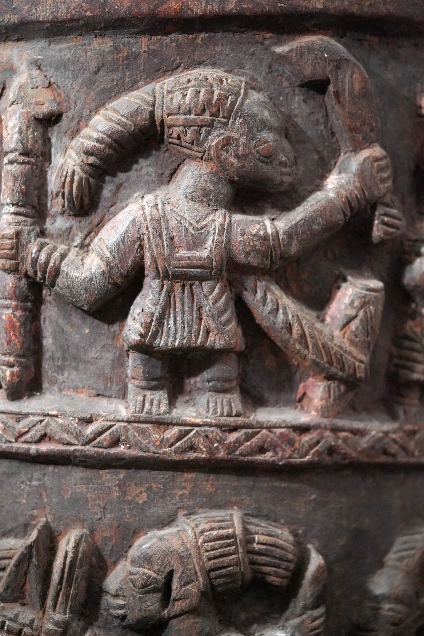 A round, one-piece standing drum on four legs