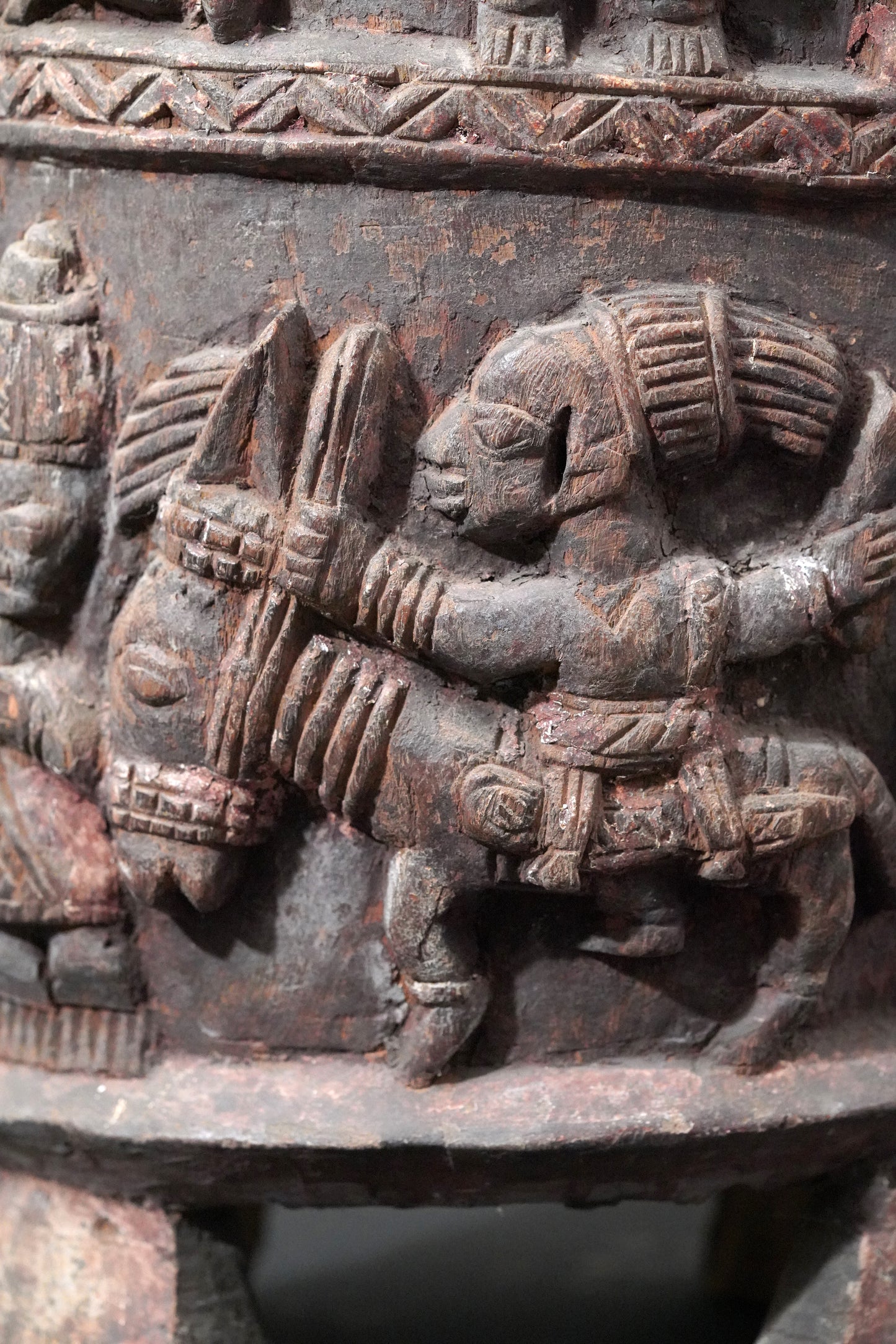 A round, one-piece standing drum on four legs