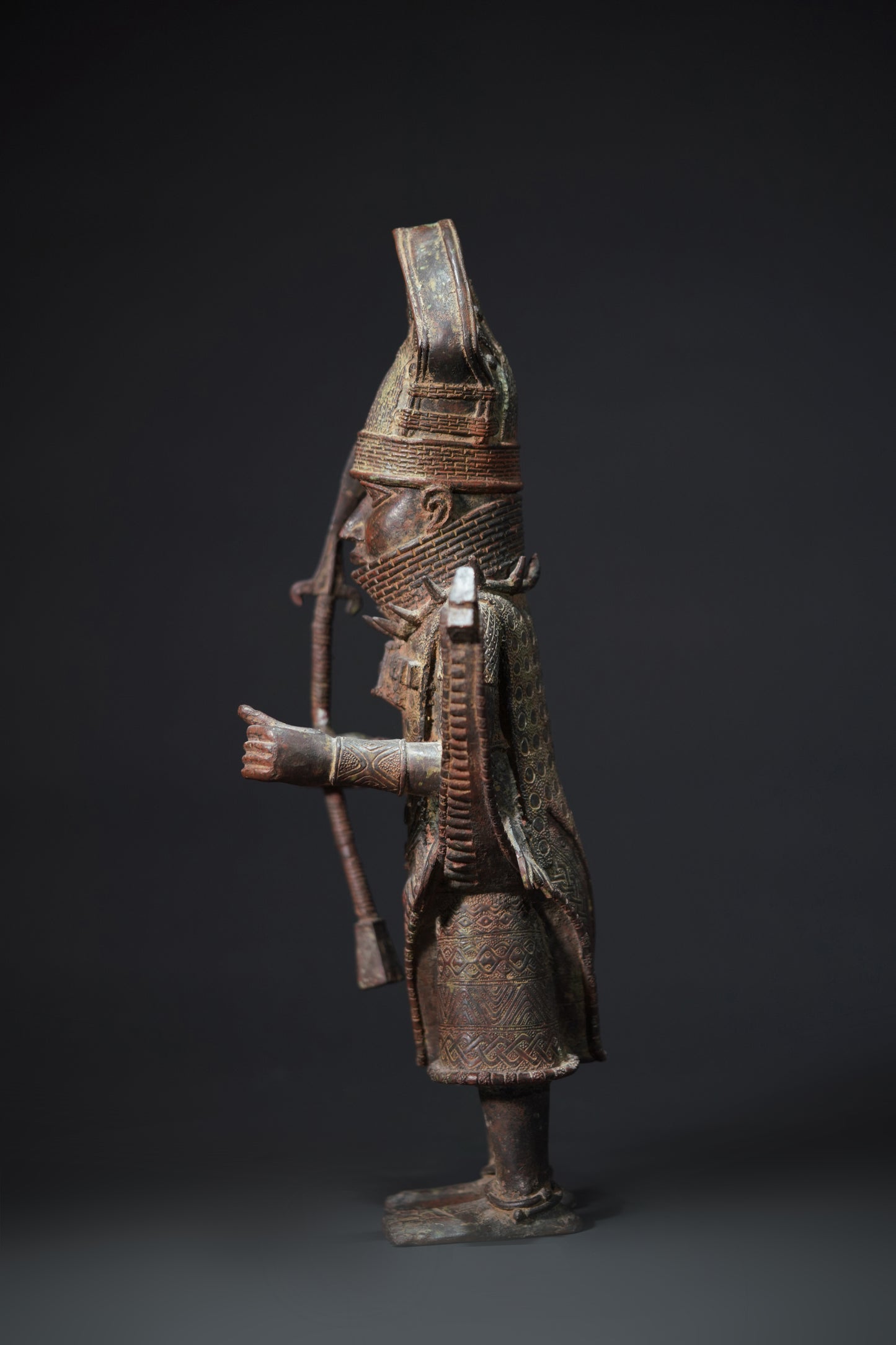 A Dignitary, brass, lost mould casting, Benin