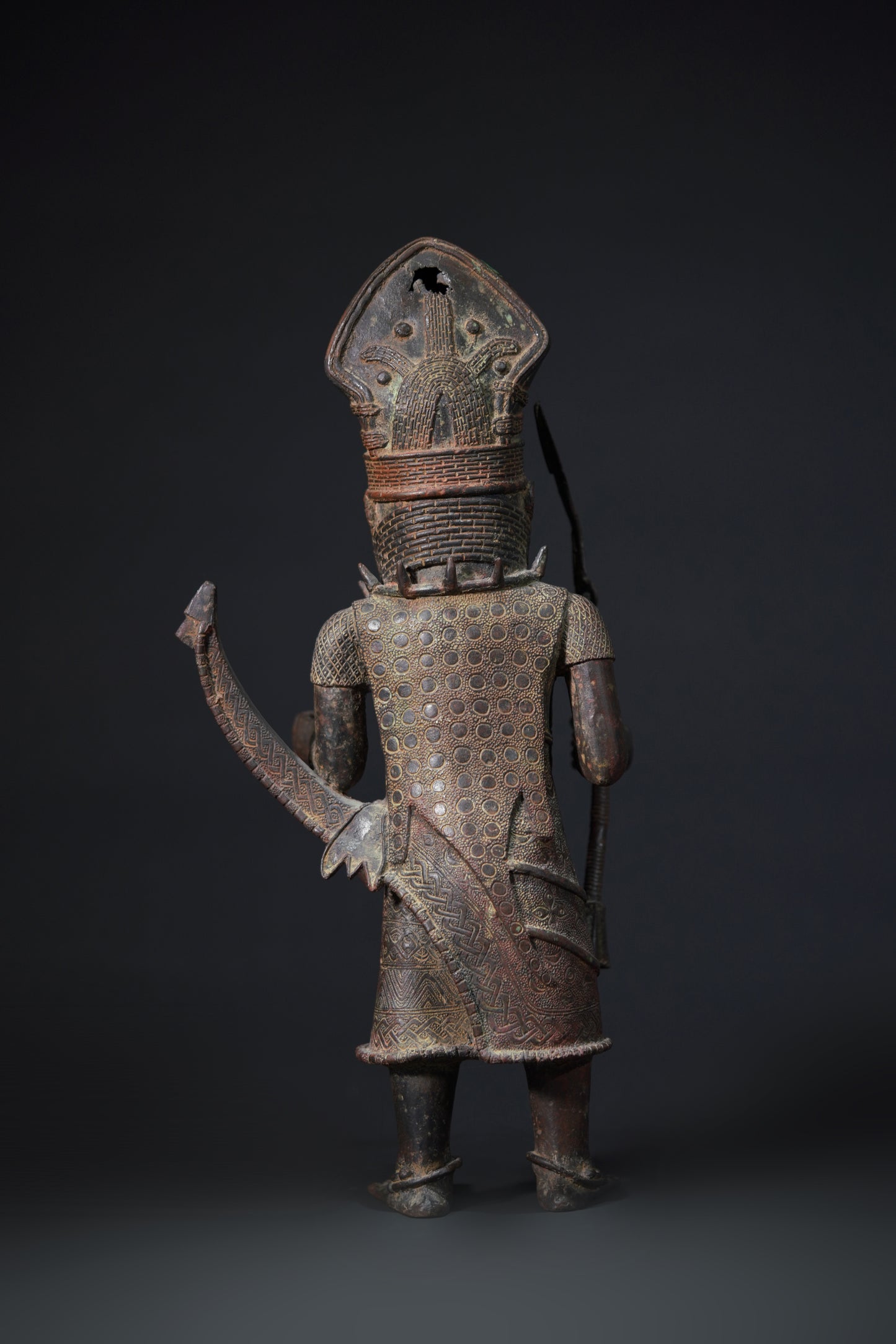 A Dignitary, brass, lost mould casting, Benin