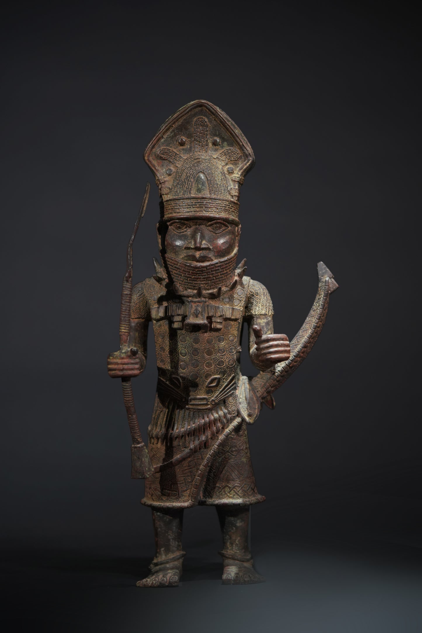 A Dignitary, brass, lost mould casting, Benin