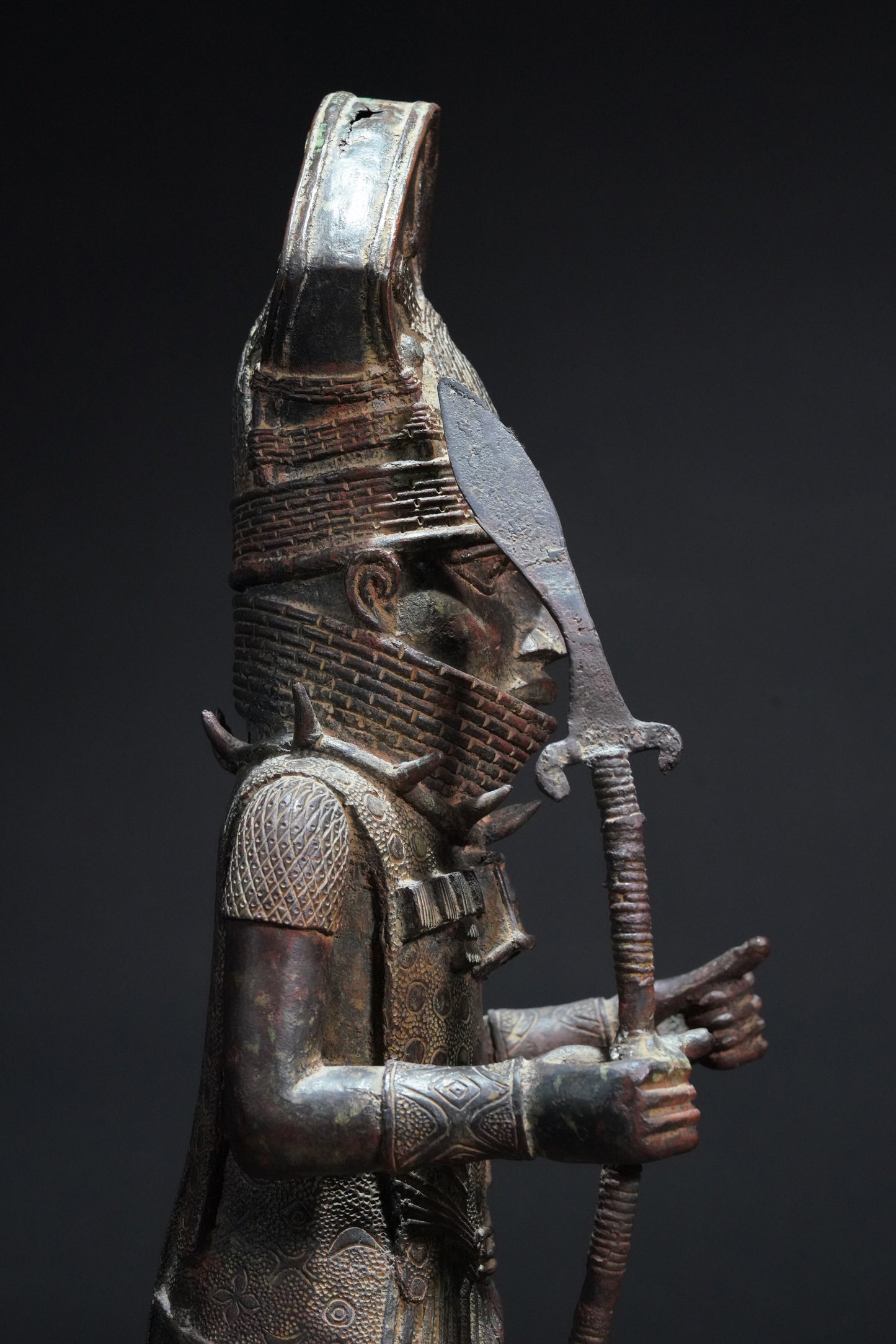 A Dignitary, brass, lost mould casting, Benin