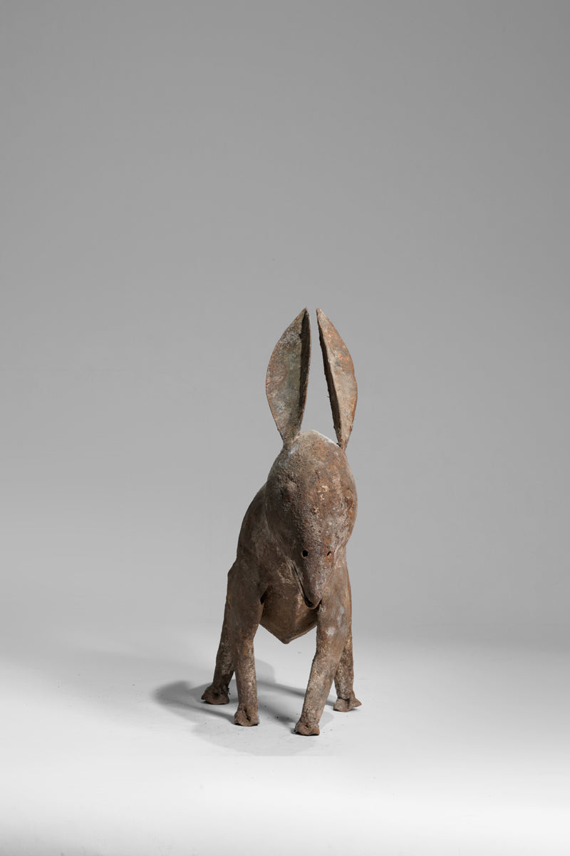 A zoomorphic Dogon bronze sculpture