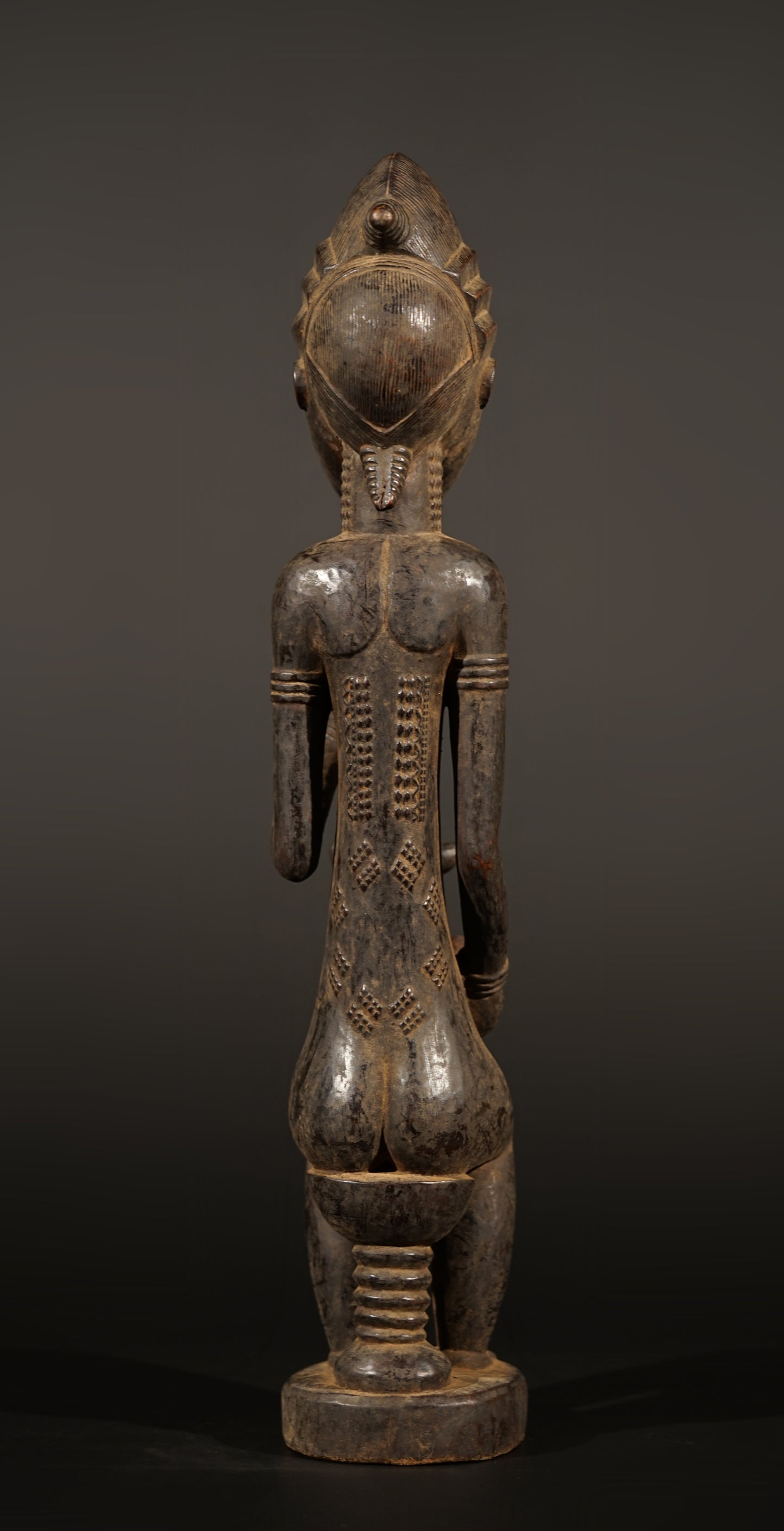 A male Baule sculpture