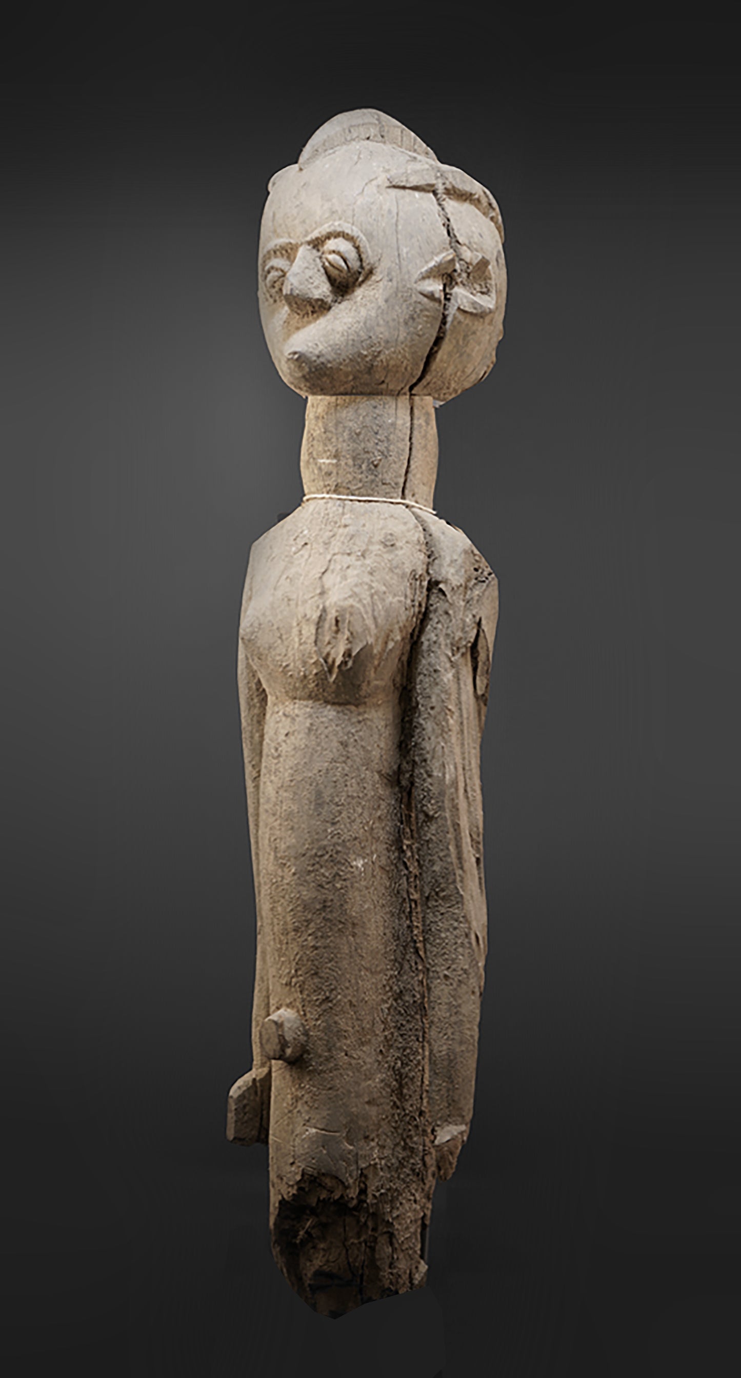 A fragmentary female Lobi sculpture