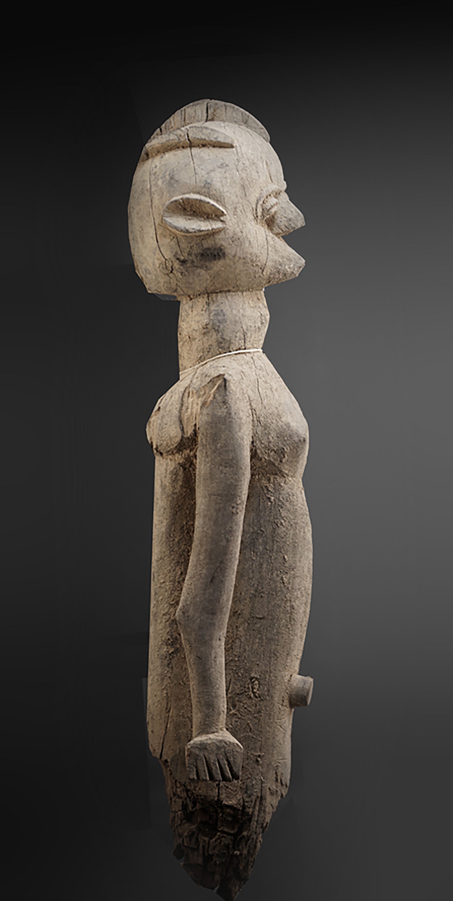 A fragmentary female Lobi sculpture