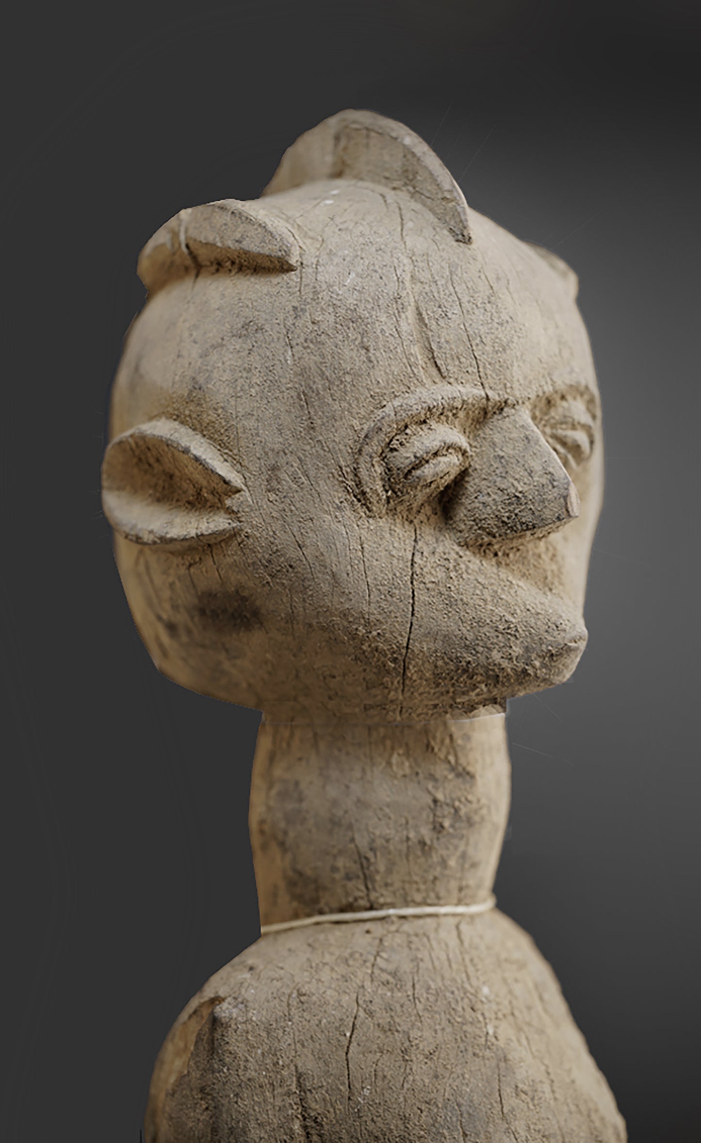 A fragmentary female Lobi sculpture