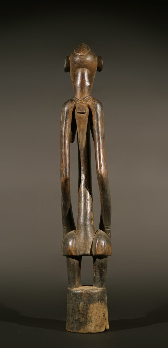 A high aged female Senufo Rhythm Pounder, called "Deblé