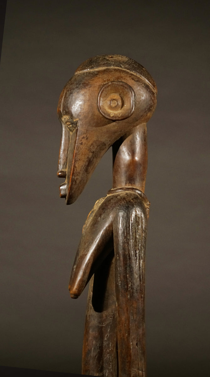 A high aged female Senufo Rhythm Pounder, called "Deblé