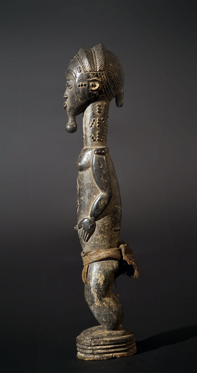 A male Baule sculpture