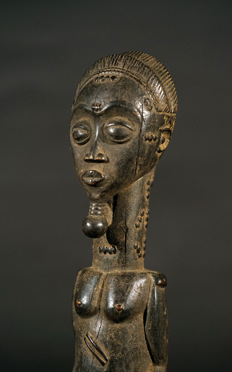 A male Baule sculpture