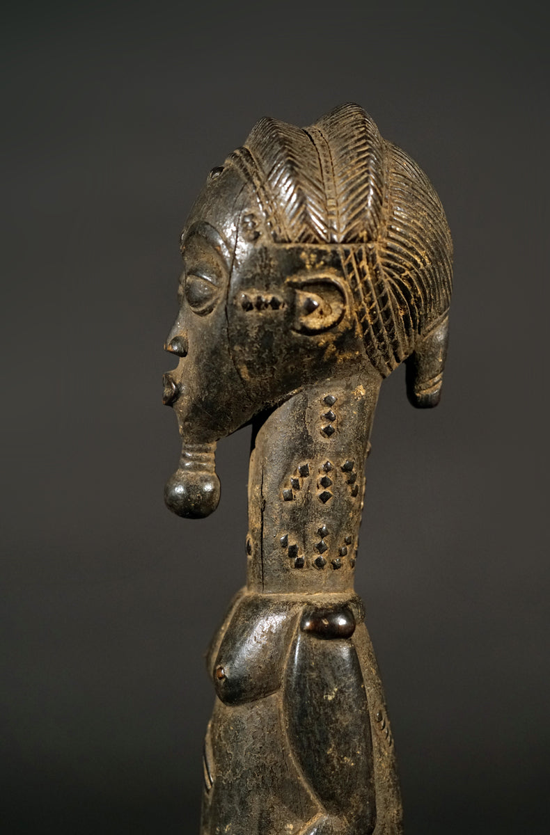 A male Baule sculpture