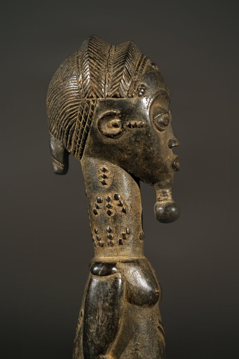 A male Baule sculpture