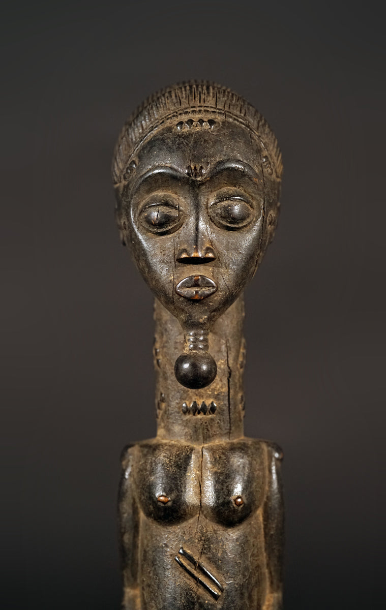 A male Baule sculpture