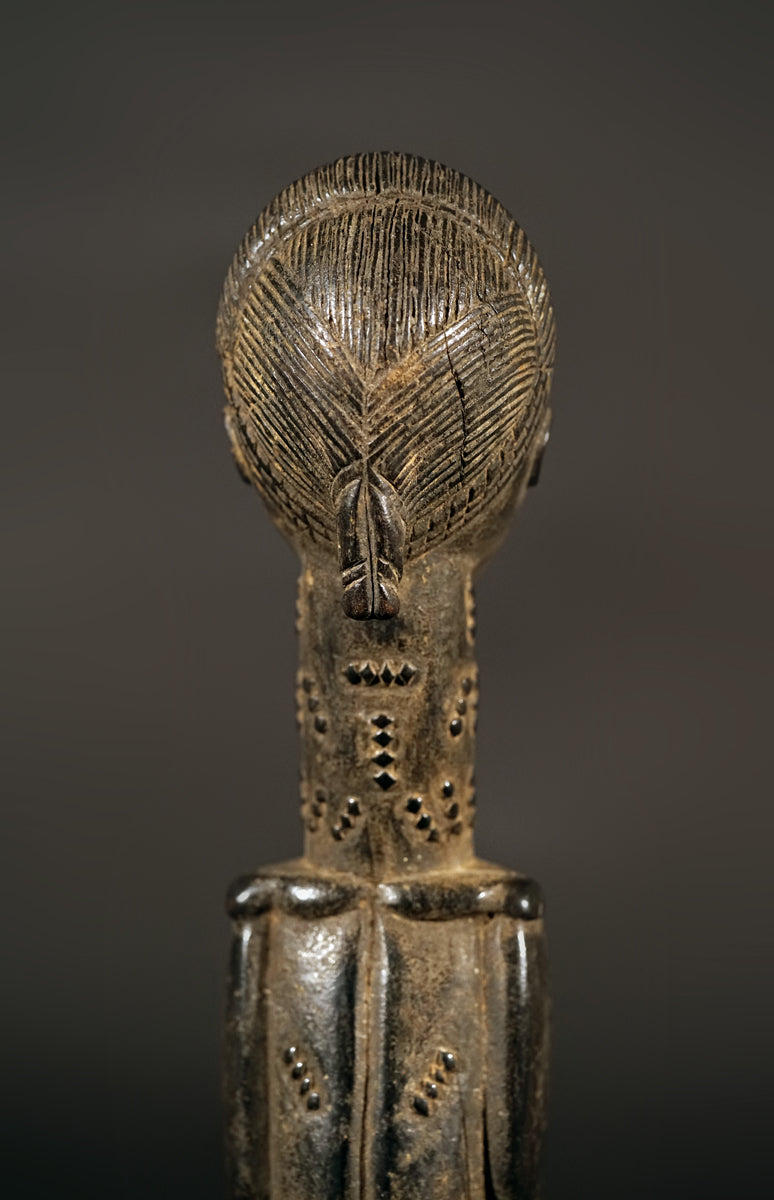 A male Baule sculpture