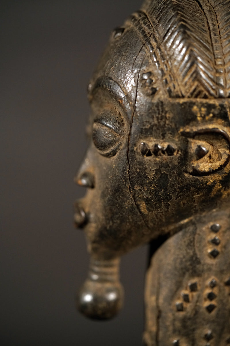 A male Baule sculpture