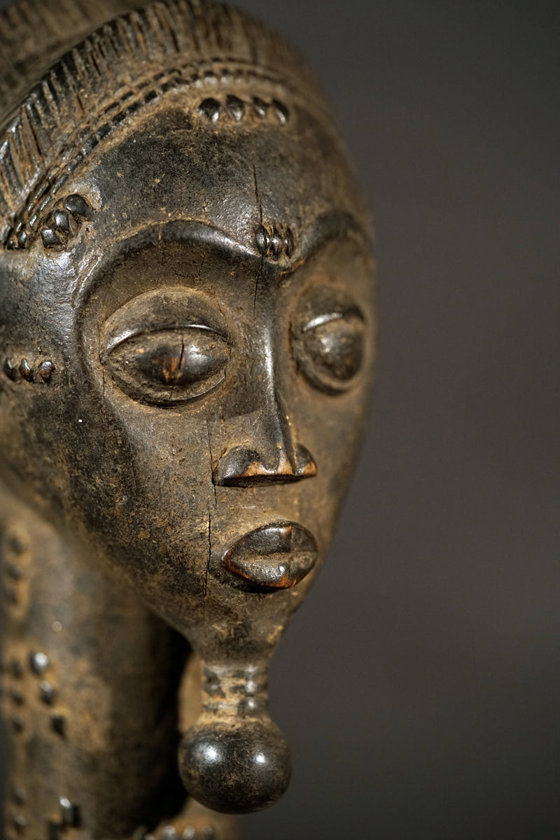 A male Baule sculpture