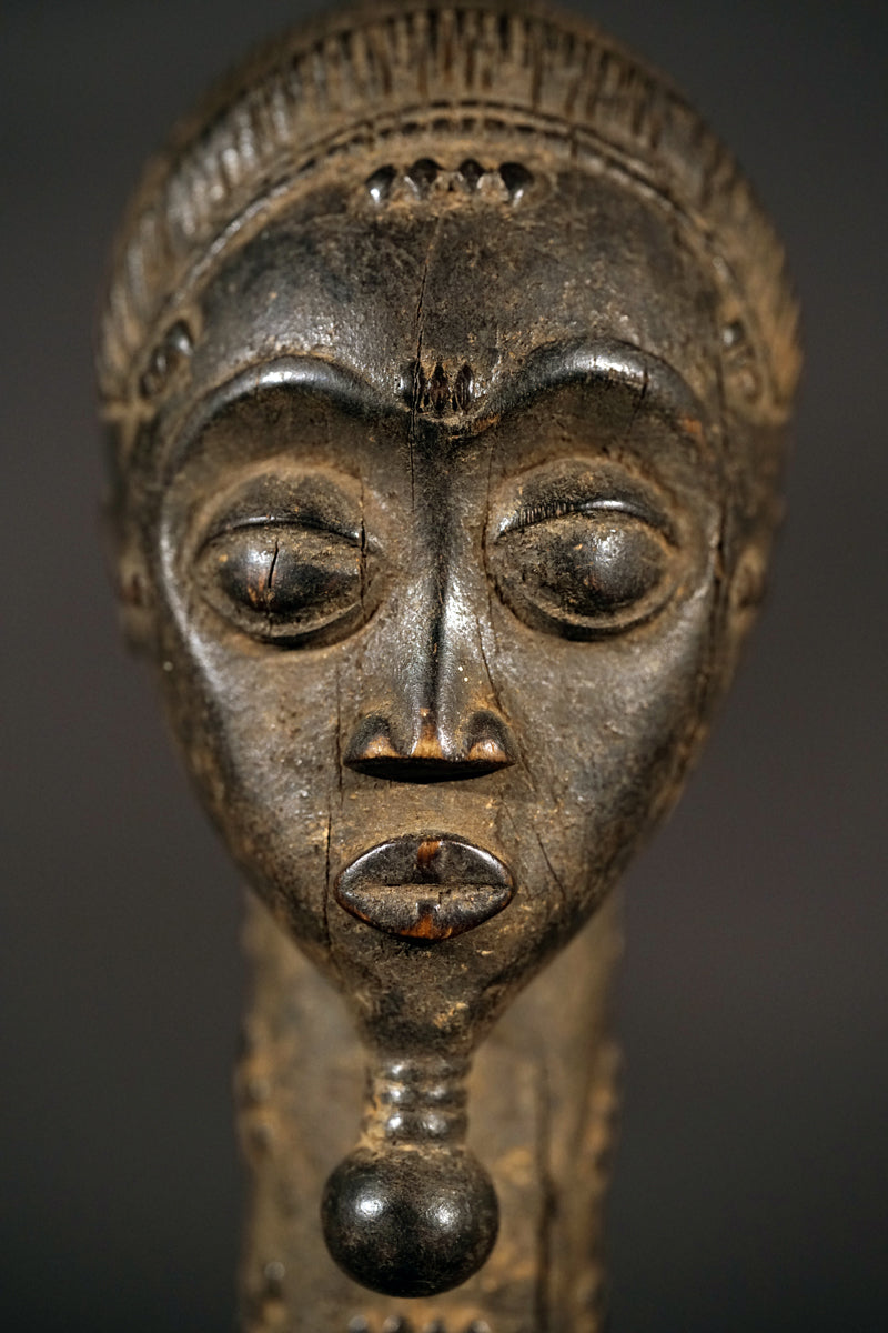 A male Baule sculpture