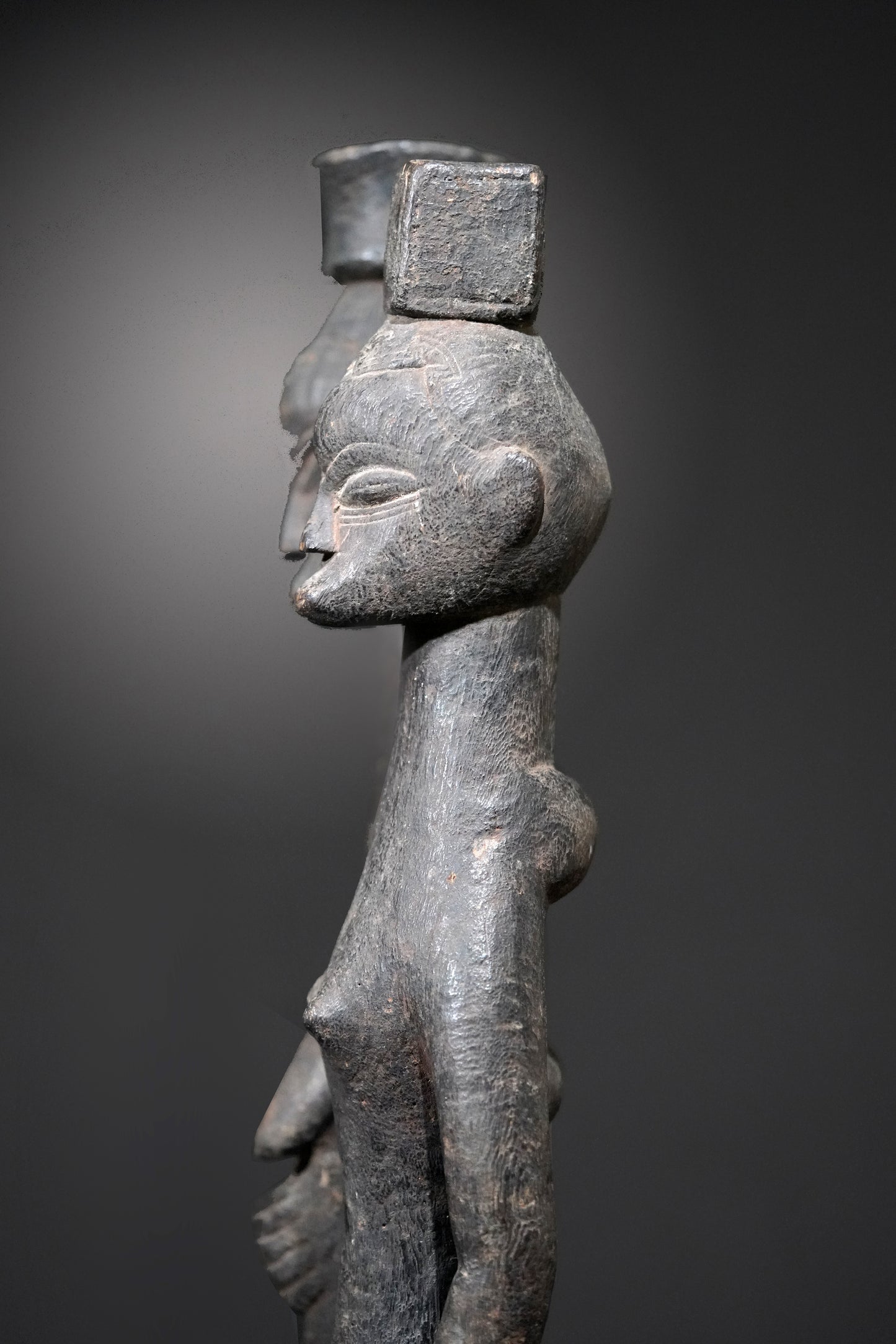 A Guro couple standing on one base