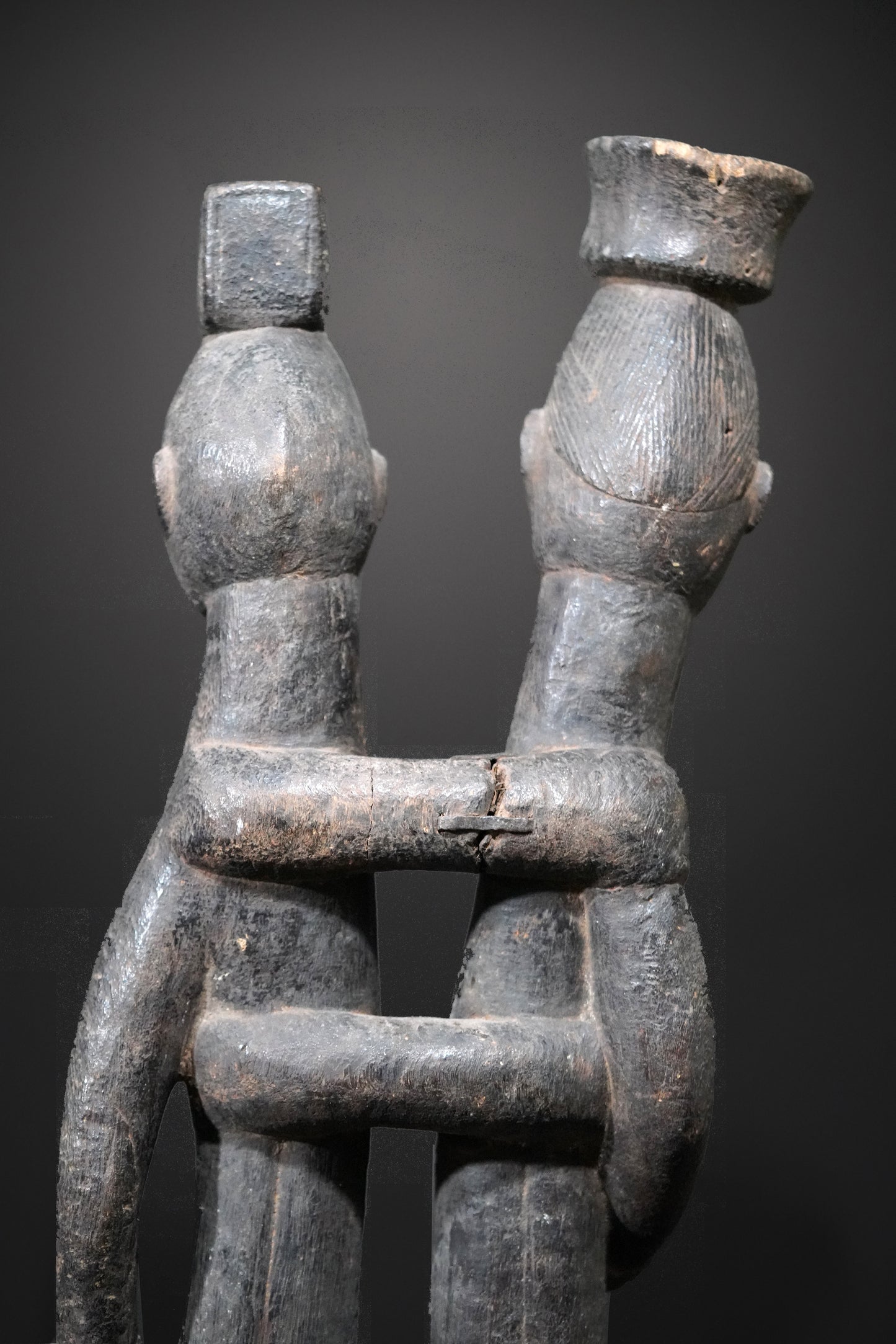 A Guro couple standing on one base
