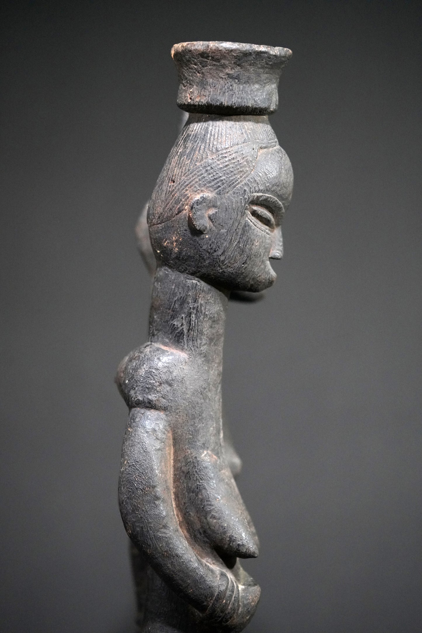 A Guro couple standing on one base
