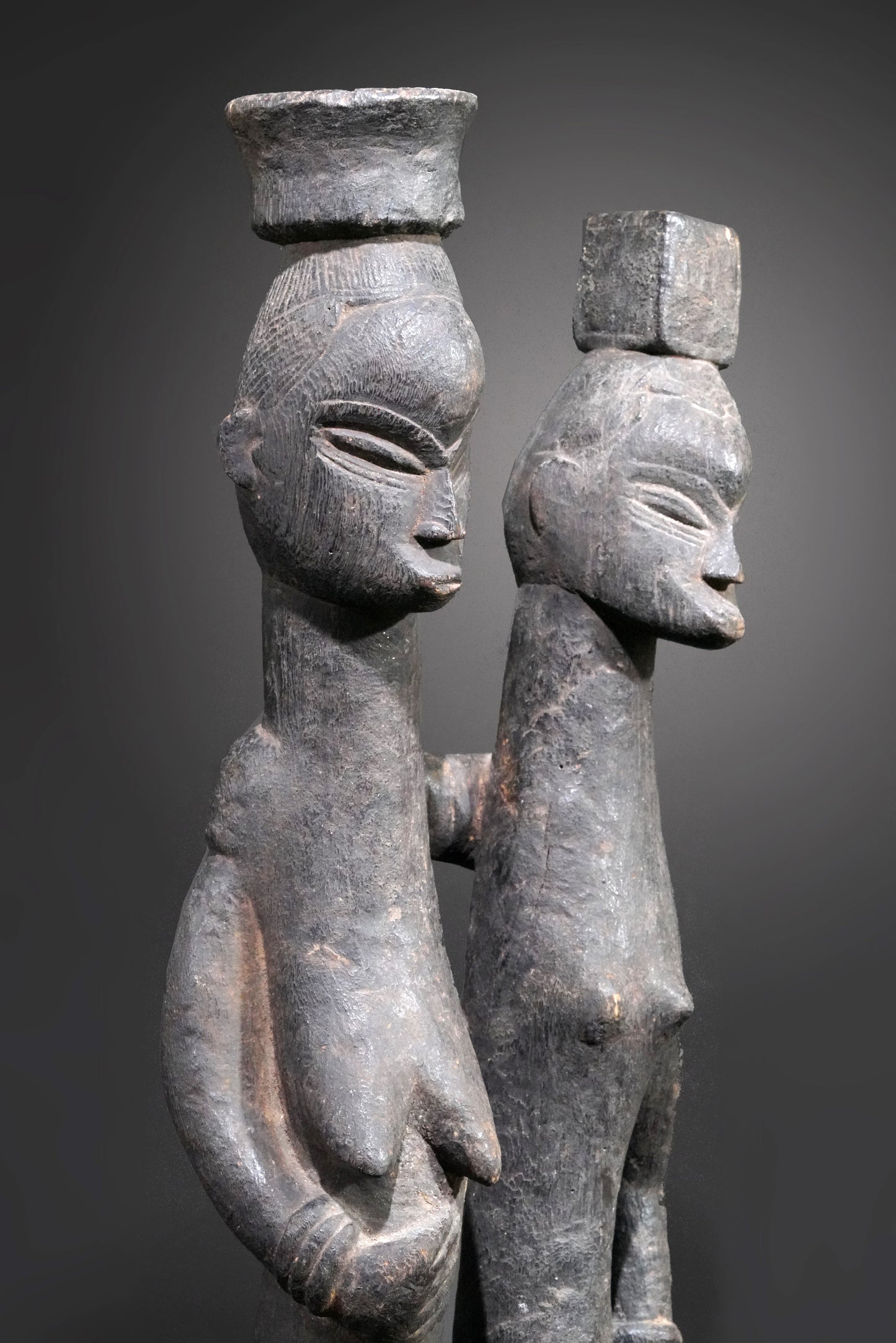 A Guro couple standing on one base