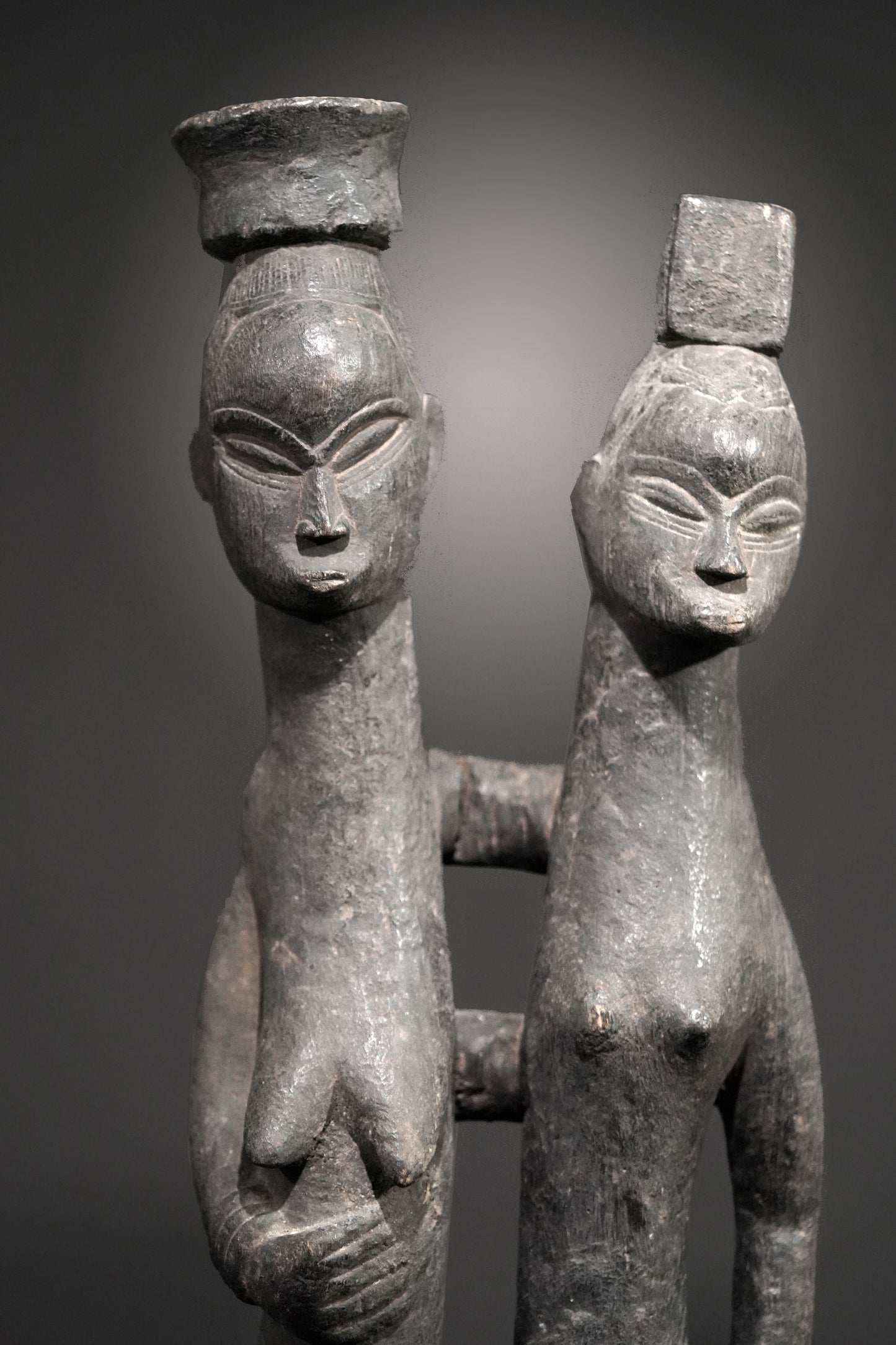 A Guro couple standing on one base