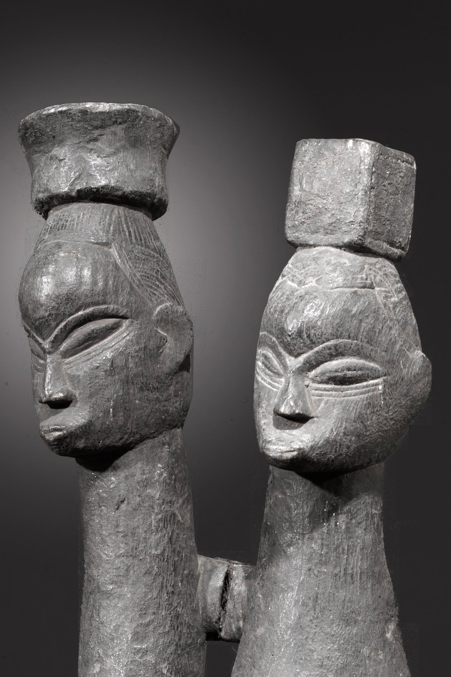 A Guro couple standing on one base