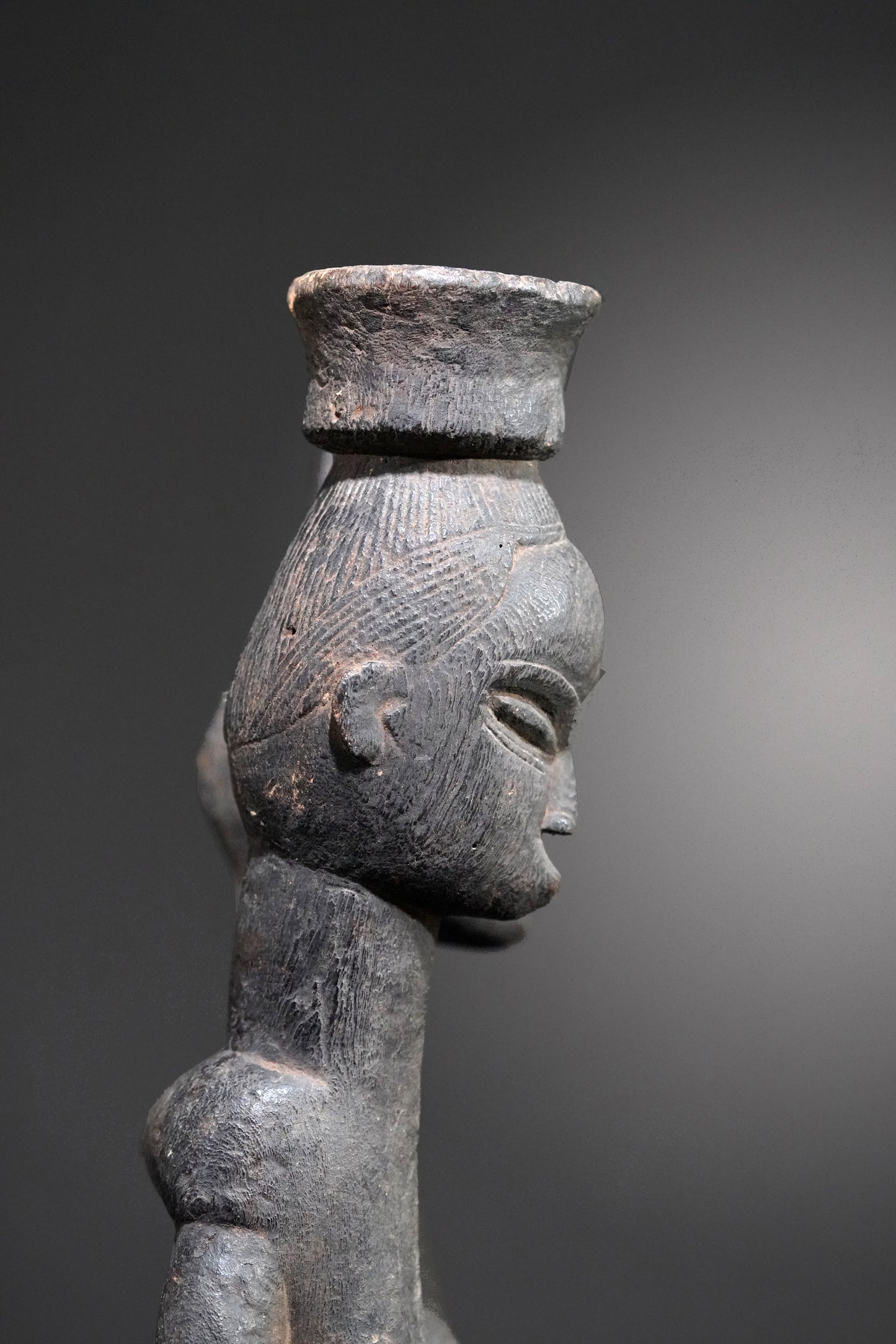 A Guro couple standing on one base