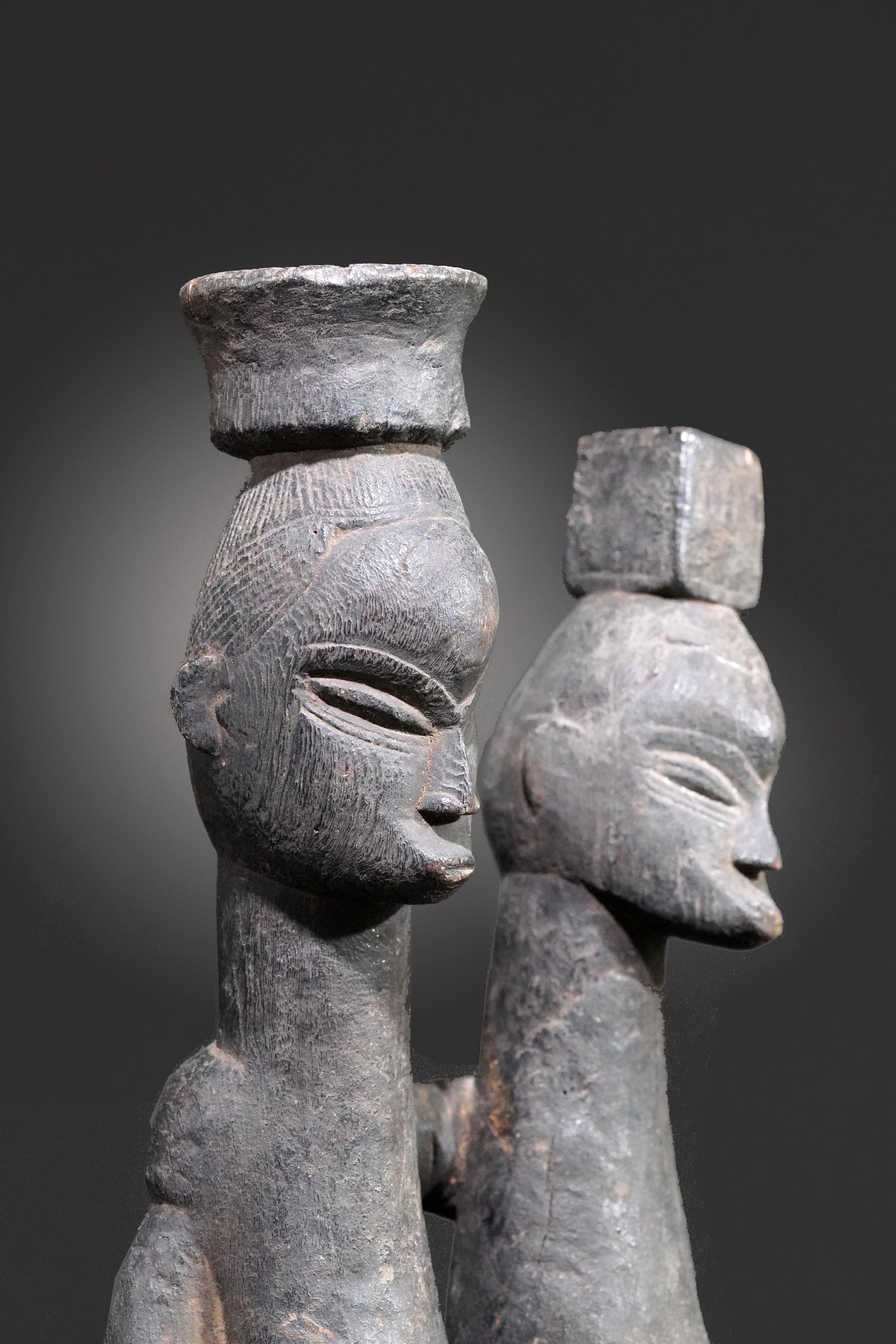 A Guro couple standing on one base
