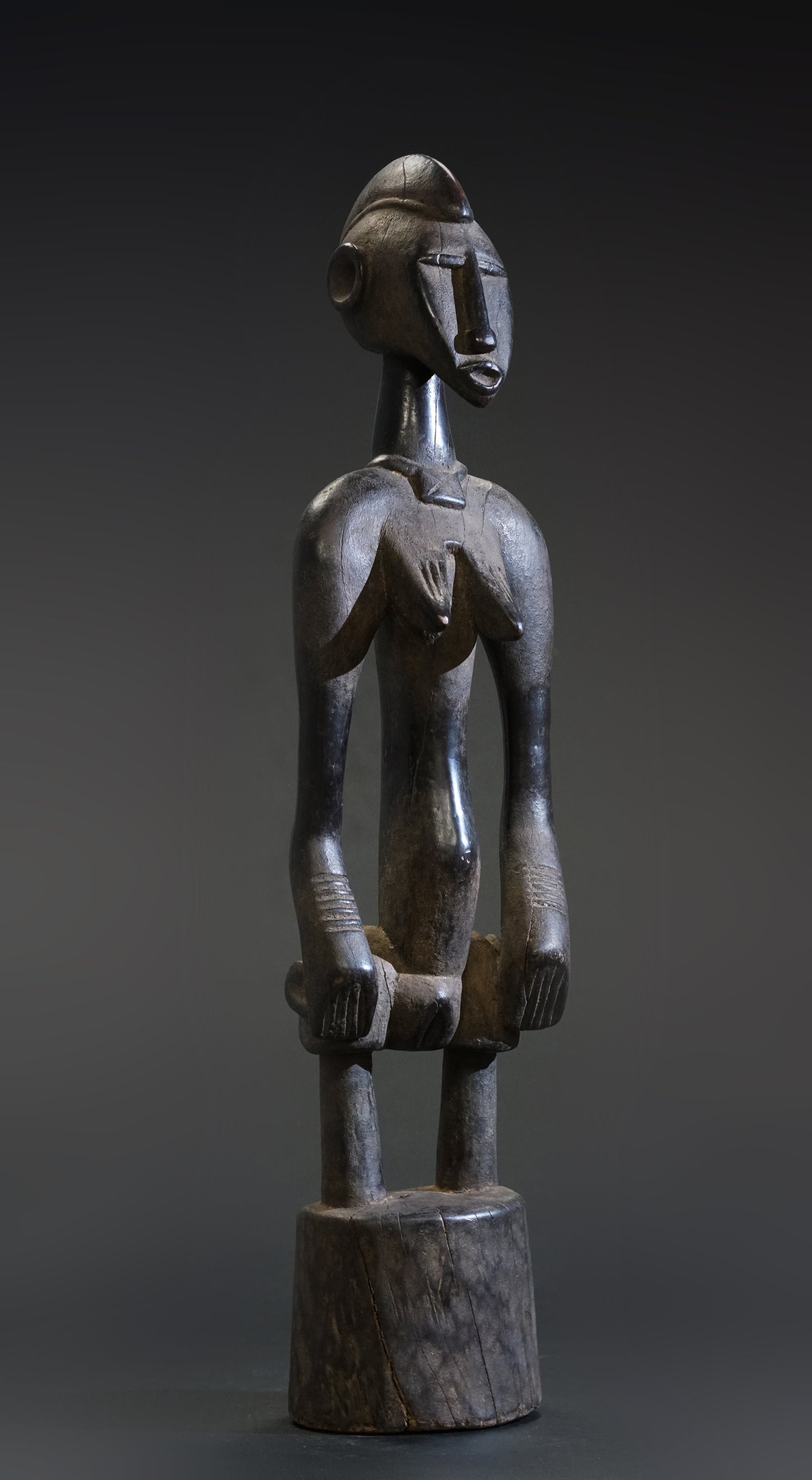 A small female Senufo Rhythm Pounder