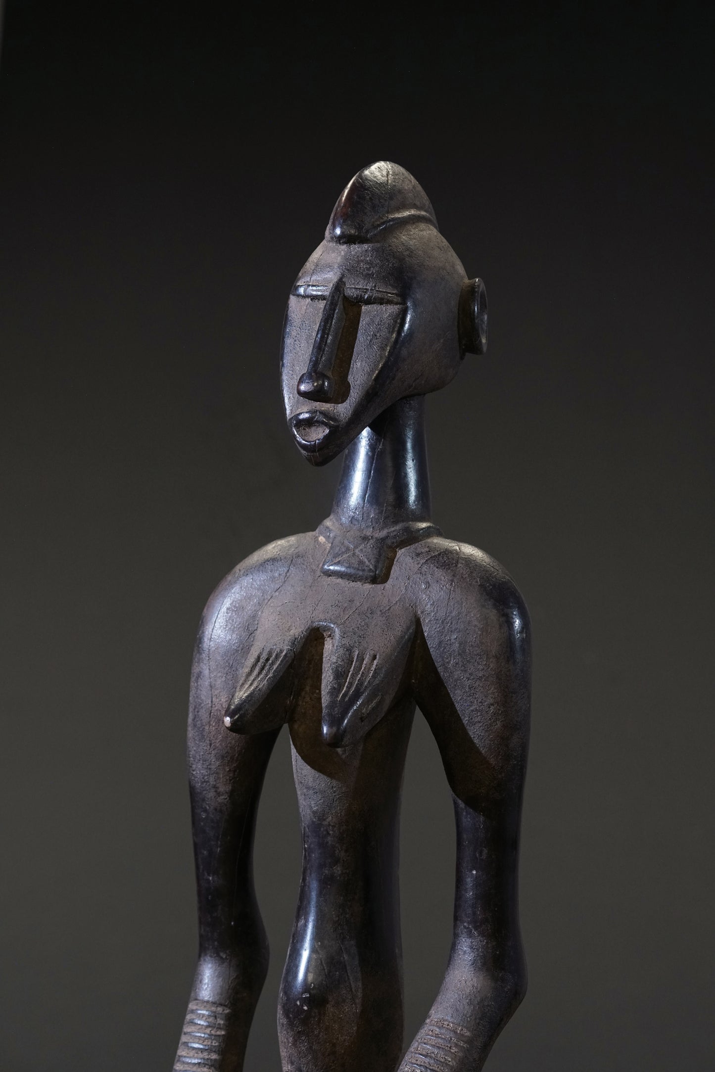 A small female Senufo Rhythm Pounder