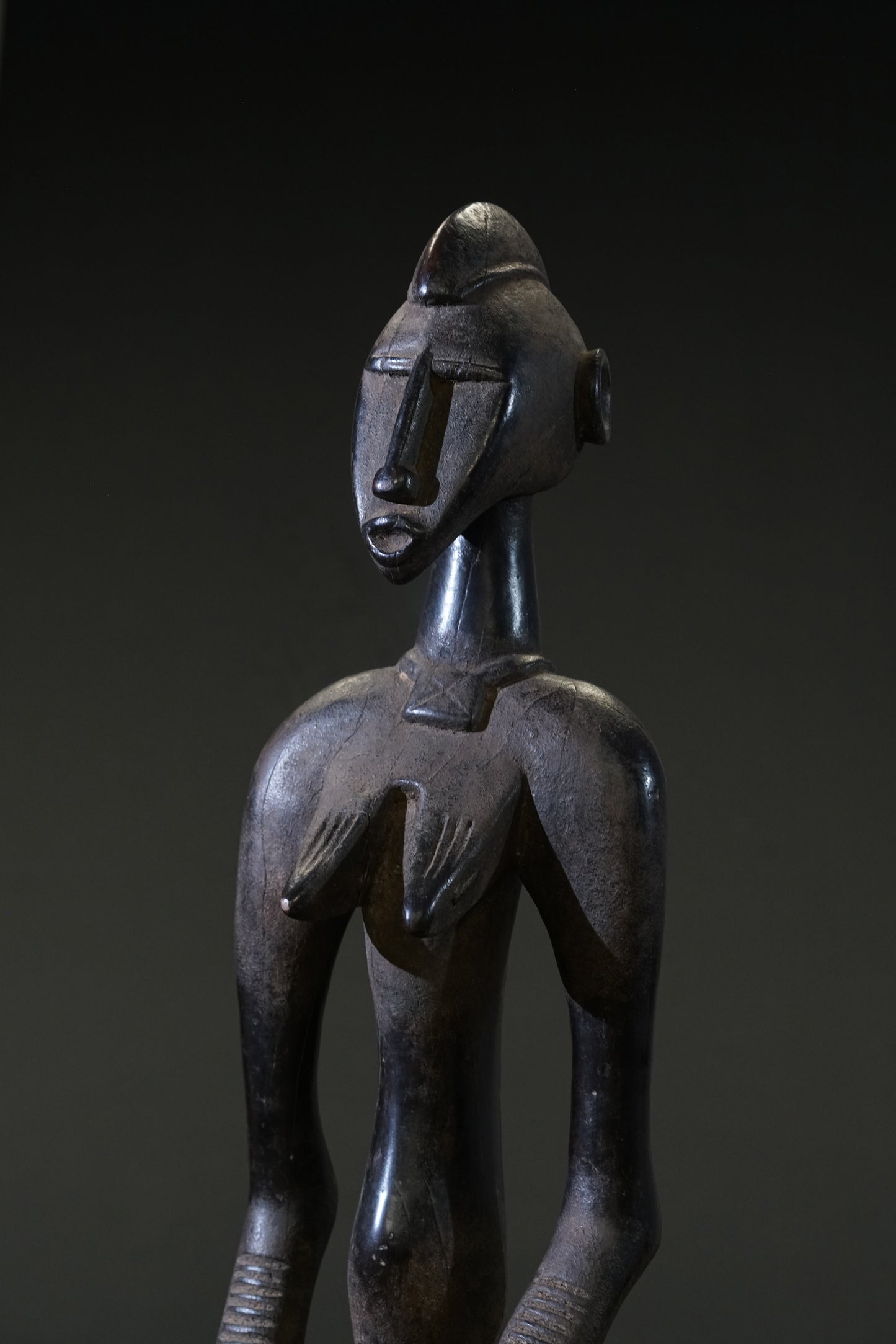 A small female Senufo Rhythm Pounder