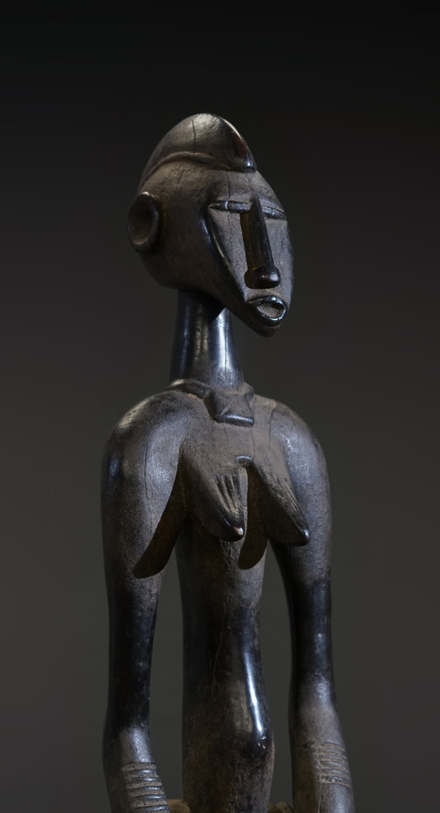 A small female Senufo Rhythm Pounder