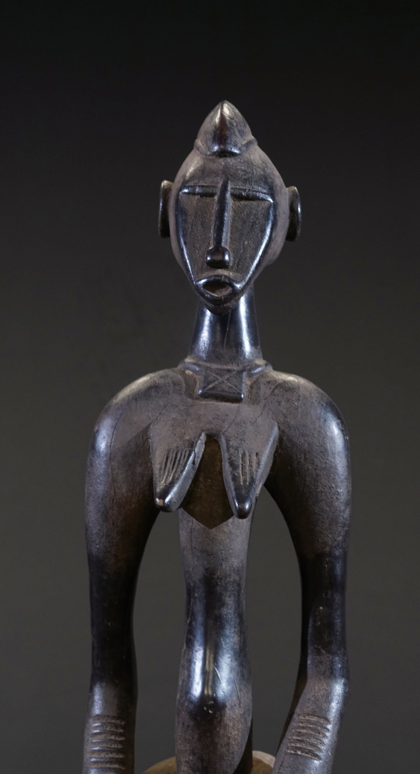 A small female Senufo Rhythm Pounder