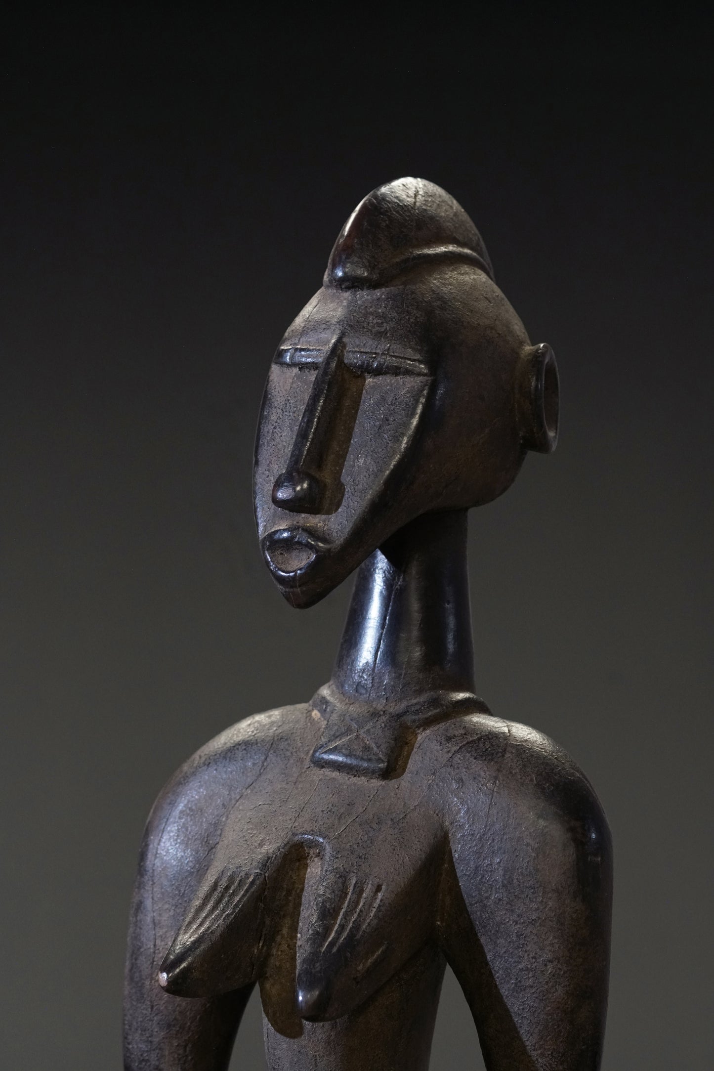 A small female Senufo Rhythm Pounder