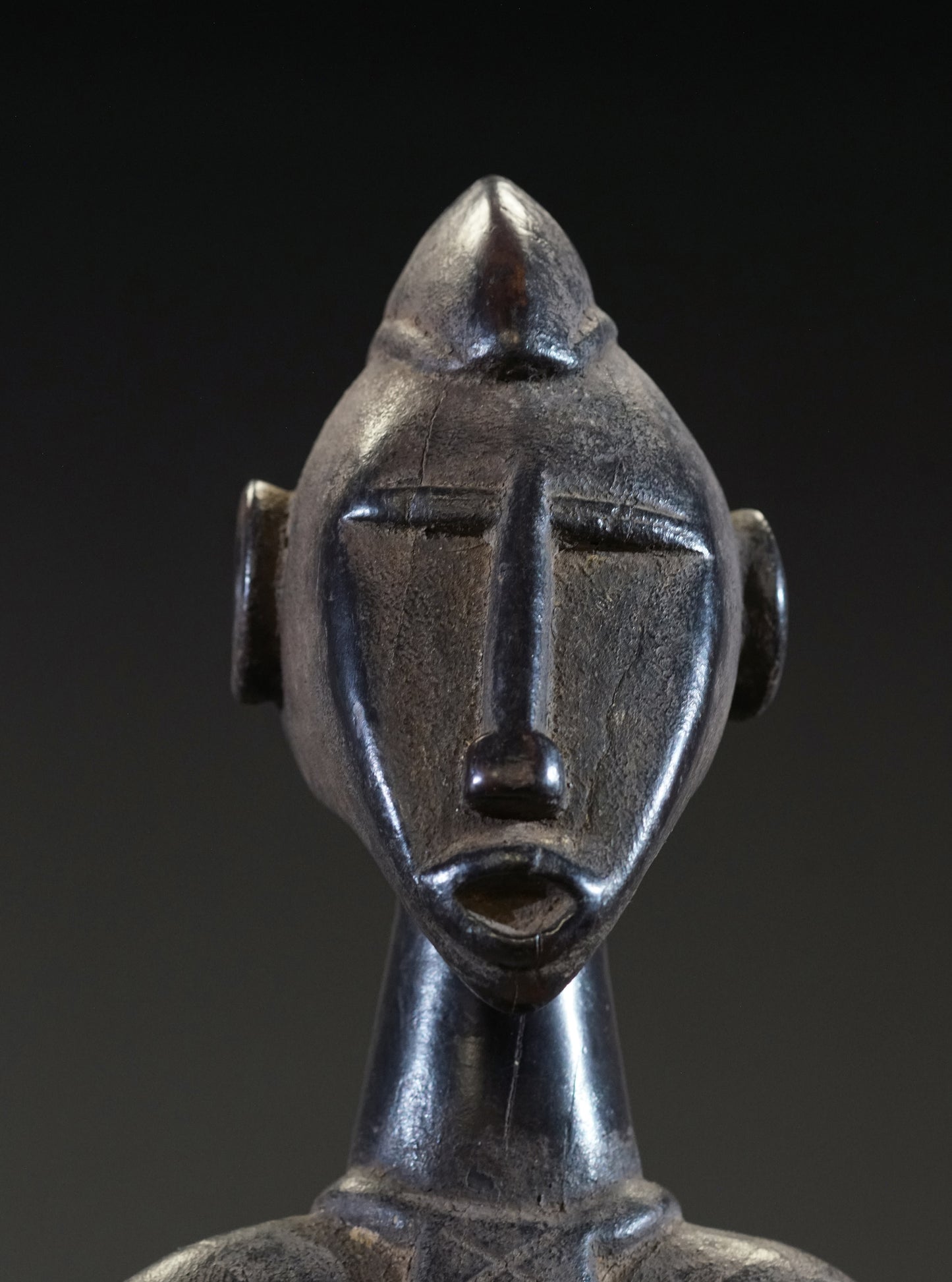 A small female Senufo Rhythm Pounder