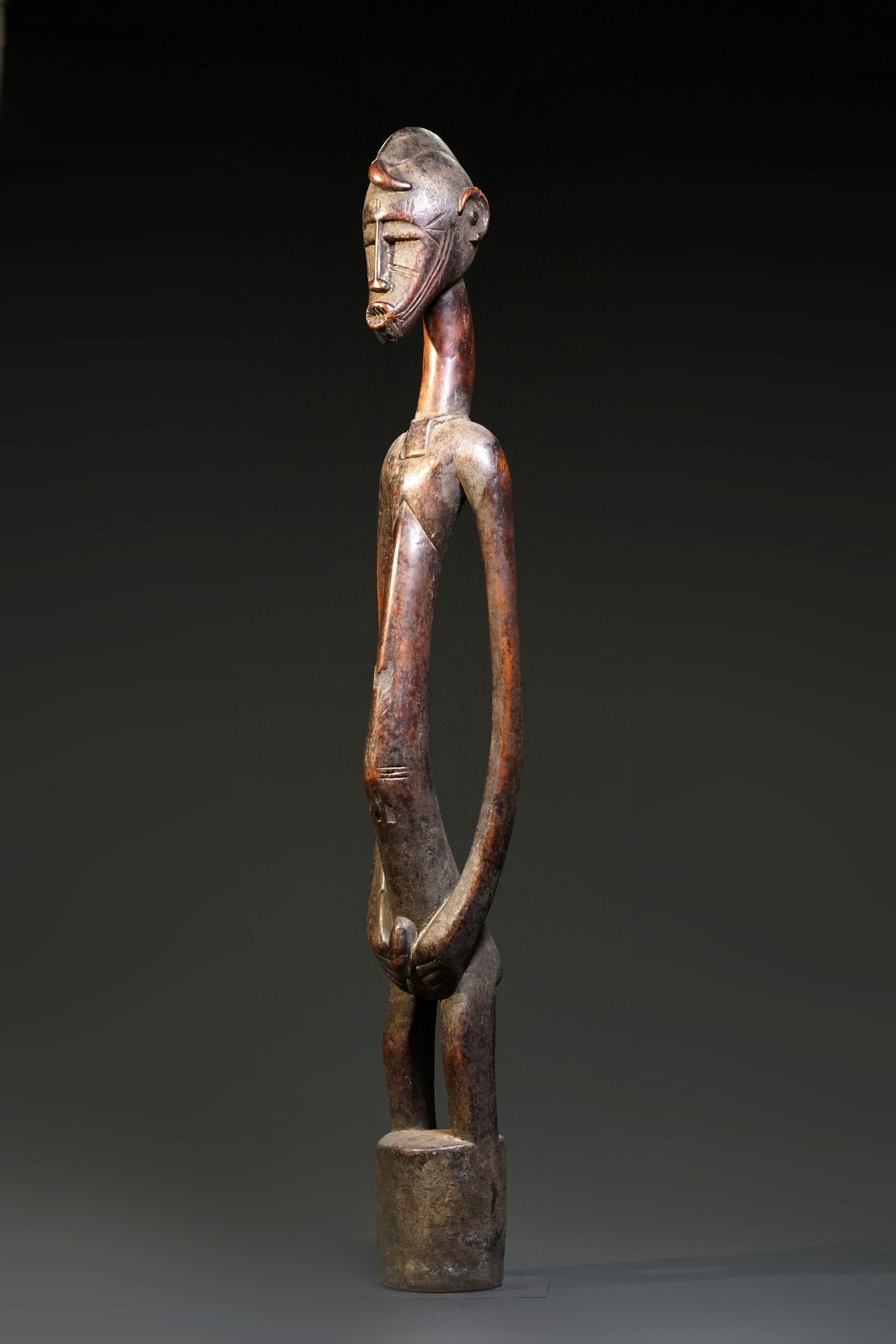 A male Senufo Rhythm Pounder, called Déblé