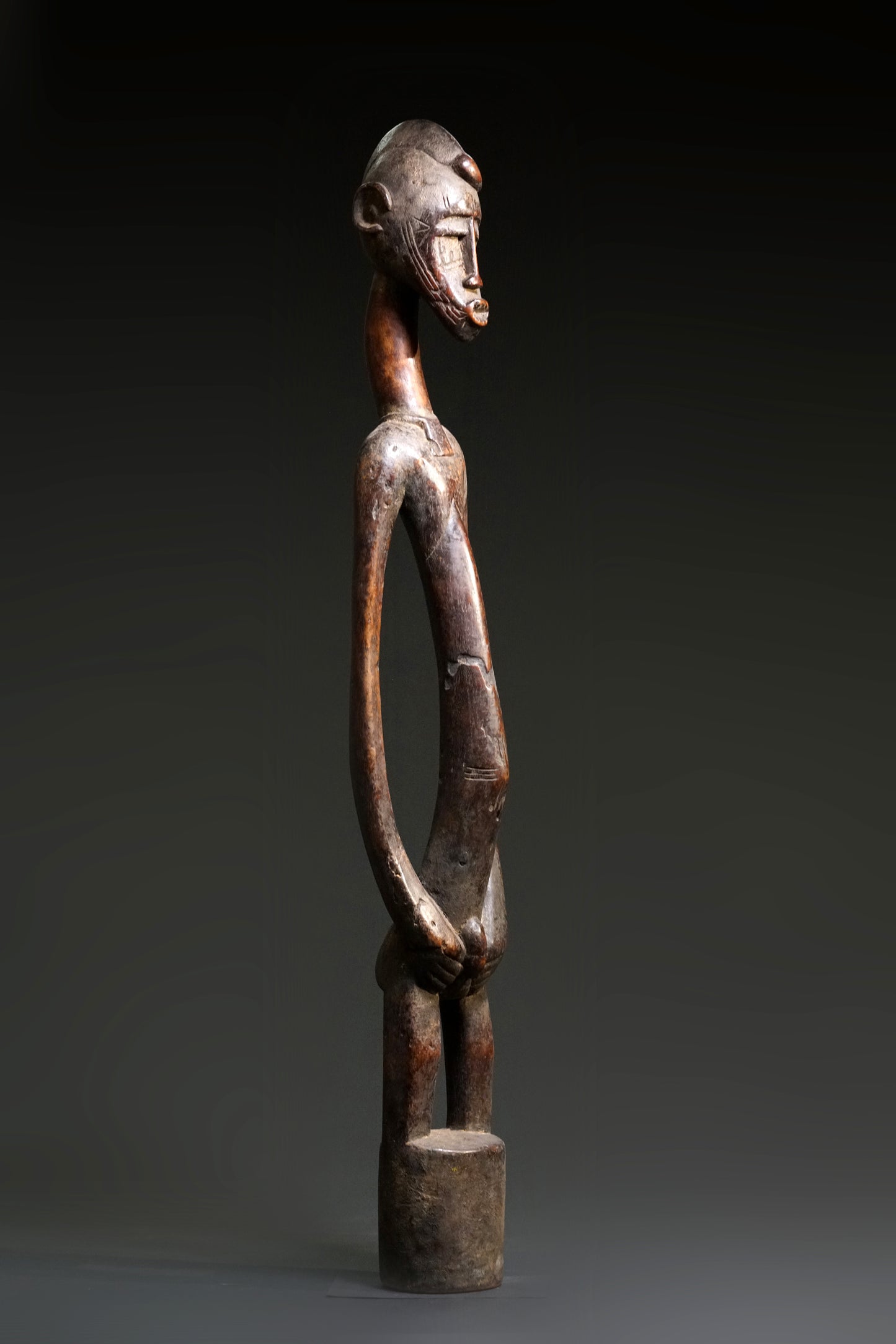 A male Senufo Rhythm Pounder, called Déblé