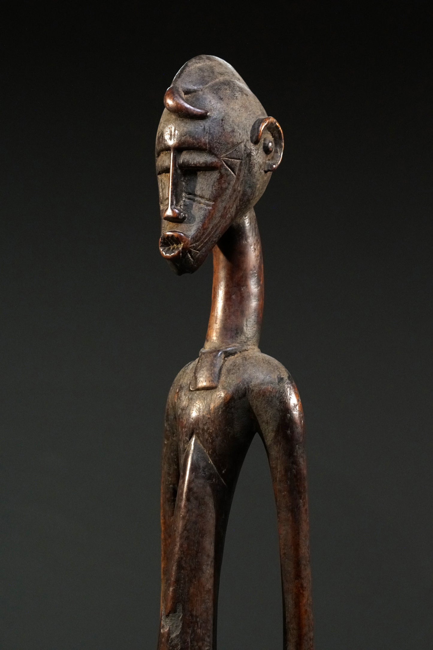 A male Senufo Rhythm Pounder, called Déblé