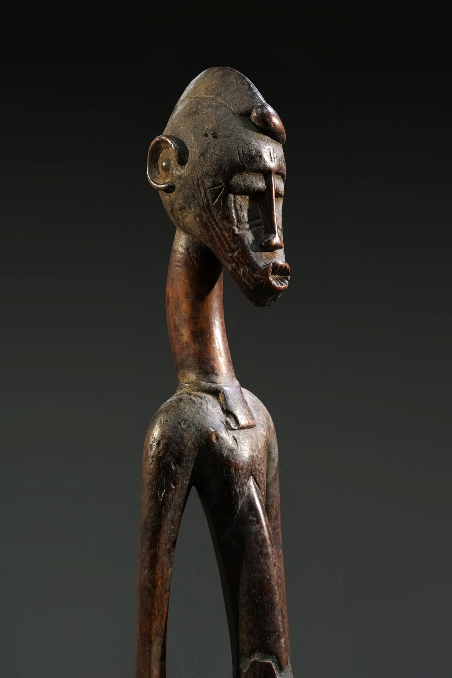A male Senufo Rhythm Pounder, called Déblé