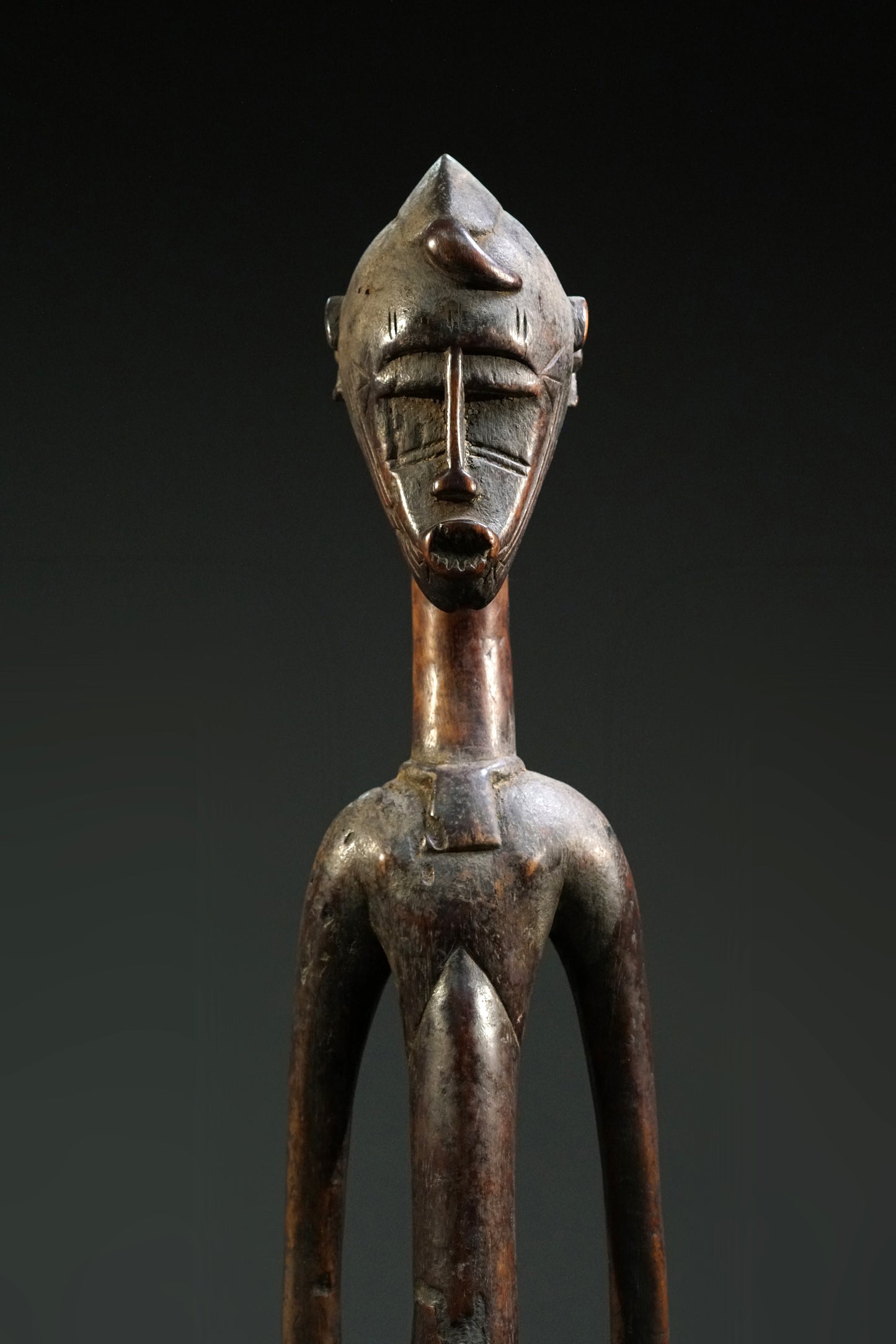 A male Senufo Rhythm Pounder, called Déblé