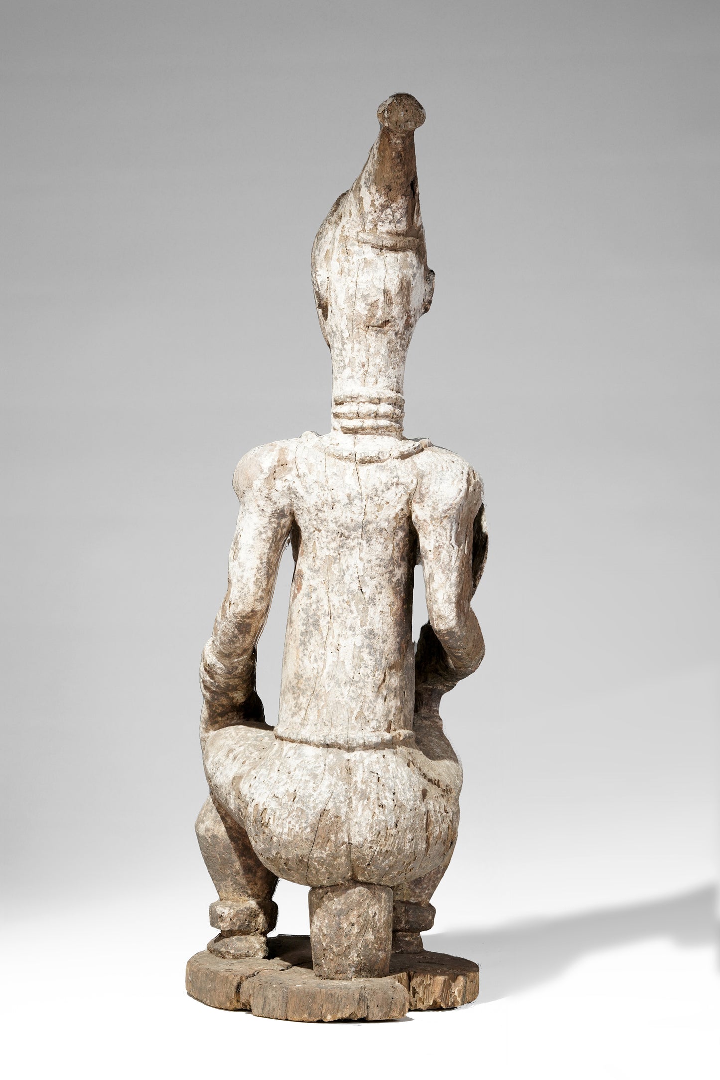 A very expressive female seated Urhobo sculpture