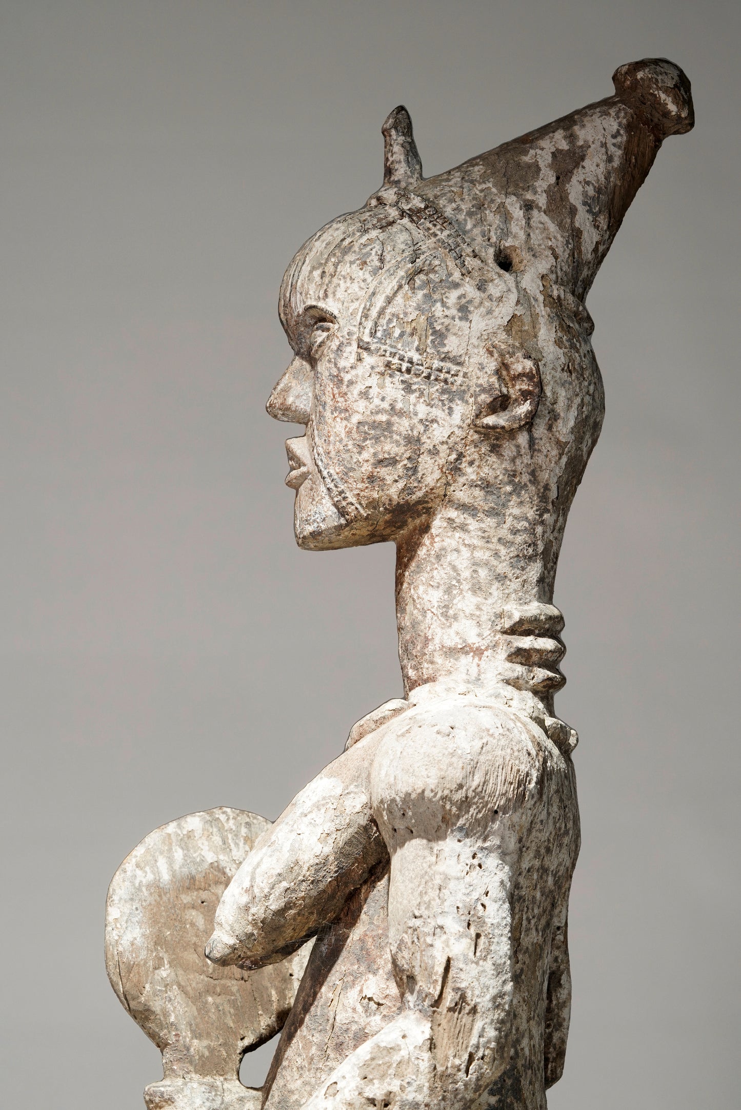 A very expressive female seated Urhobo sculpture