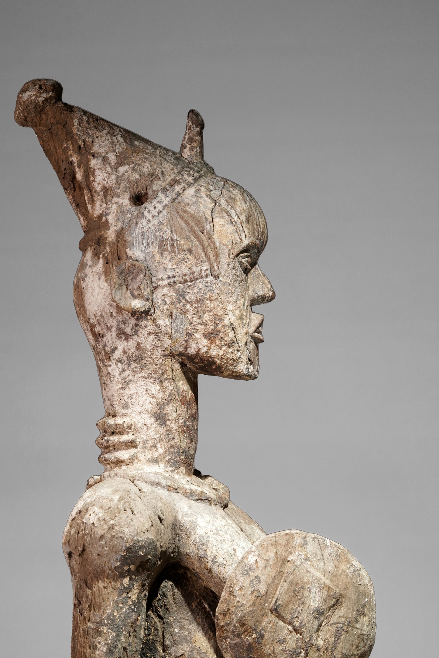 A very expressive female seated Urhobo sculpture