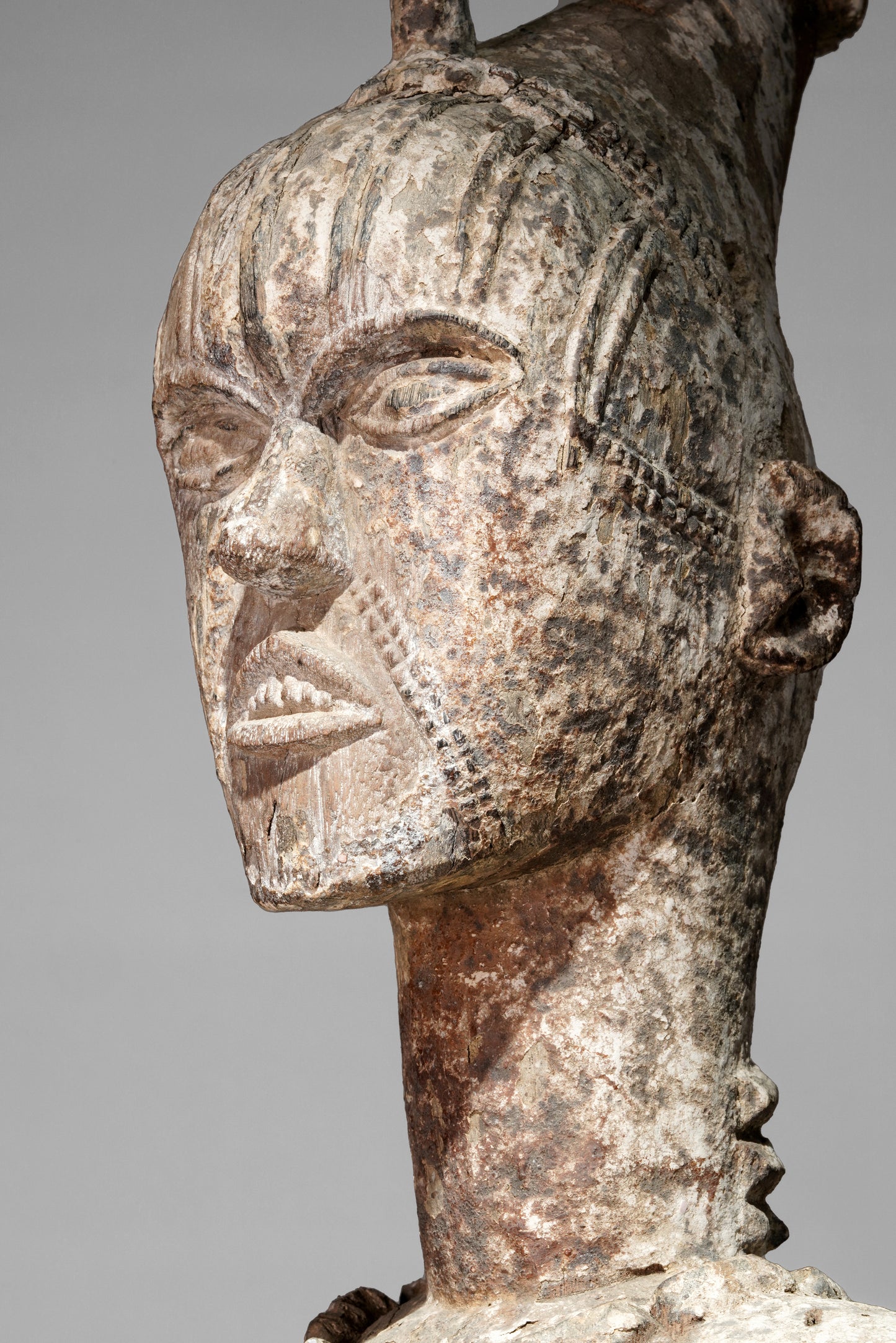 A very expressive female seated Urhobo sculpture